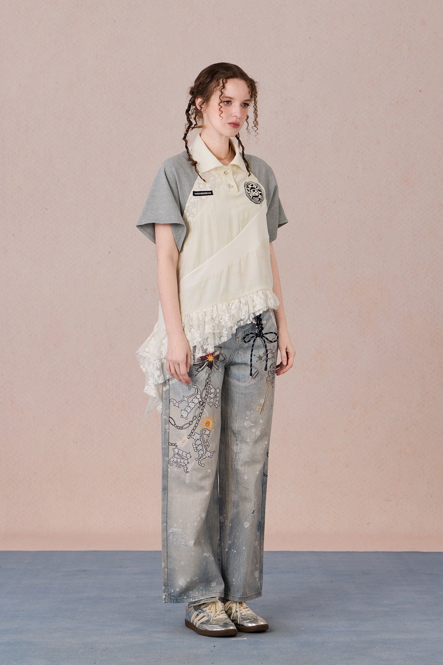  Loose-fit oriental top with ruffled hem and gyroscopic panels
