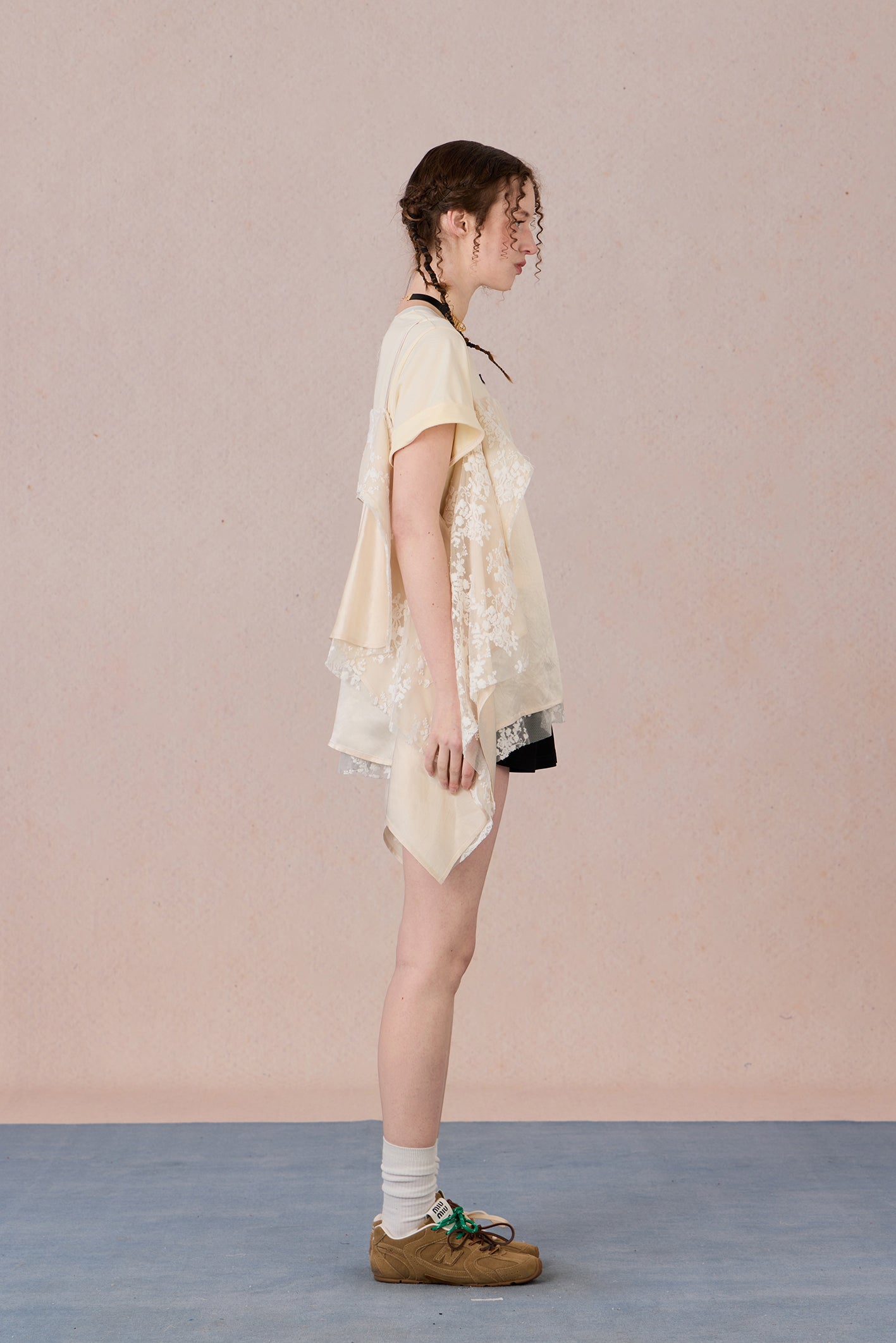 Romantic two-piece look blouse paired with trousers