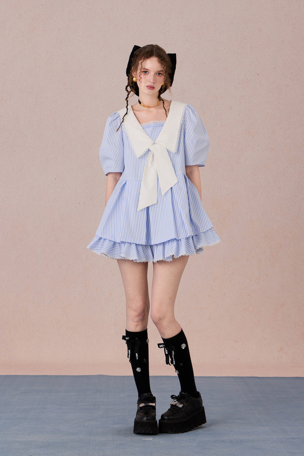  Vintage puff sleeve dress with ruffle hem and tie-neck detail