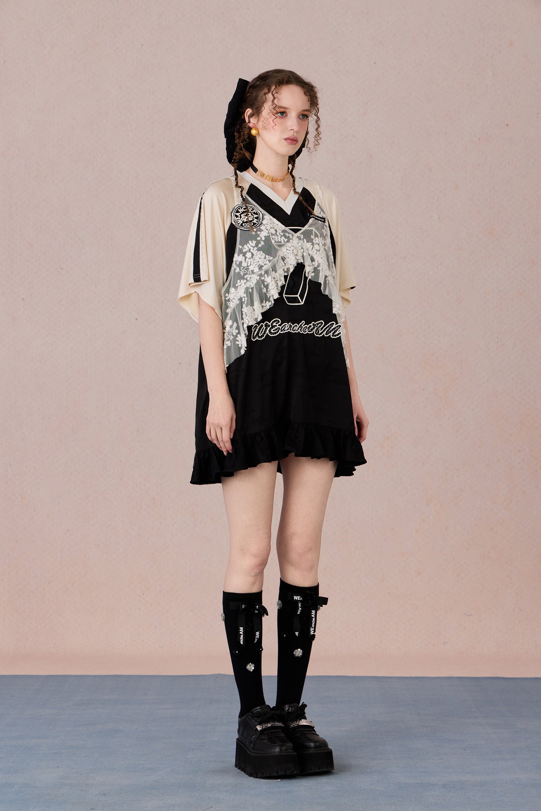 Summer sporty-style lace dress with flowing ruffle hem and halter neckline