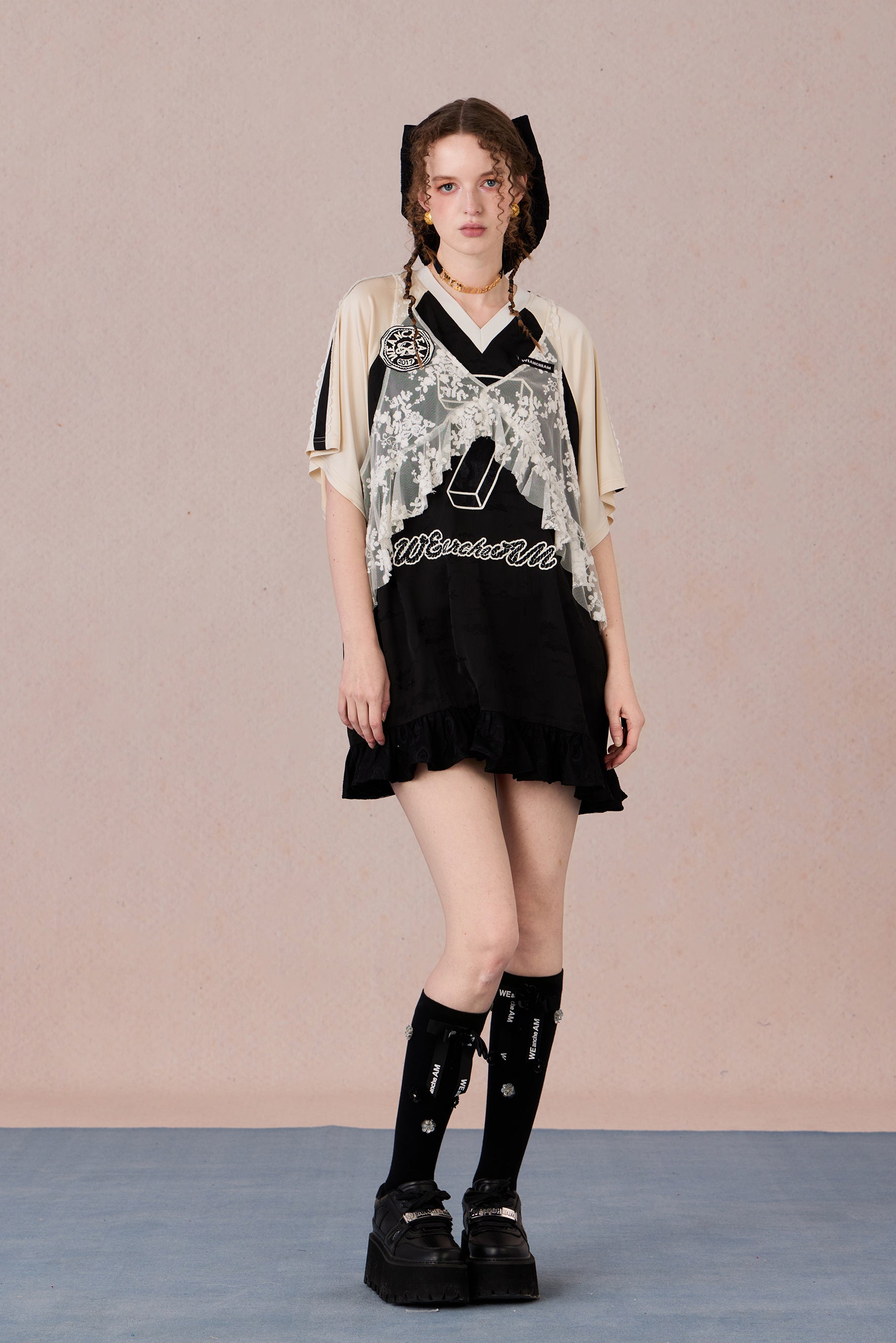 Summer sporty-style lace dress with flowing ruffle hem and halter neckline