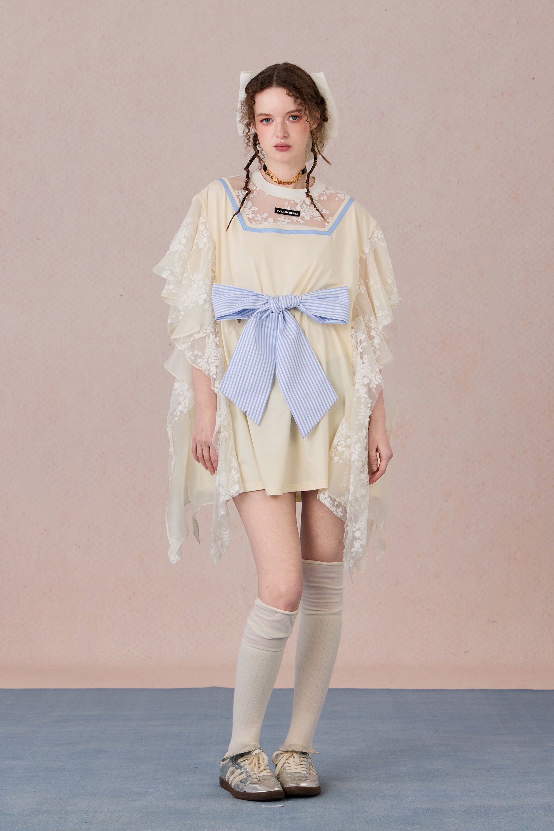 Fairycore-inspired dress with lace neckline and soft flowing silhouette