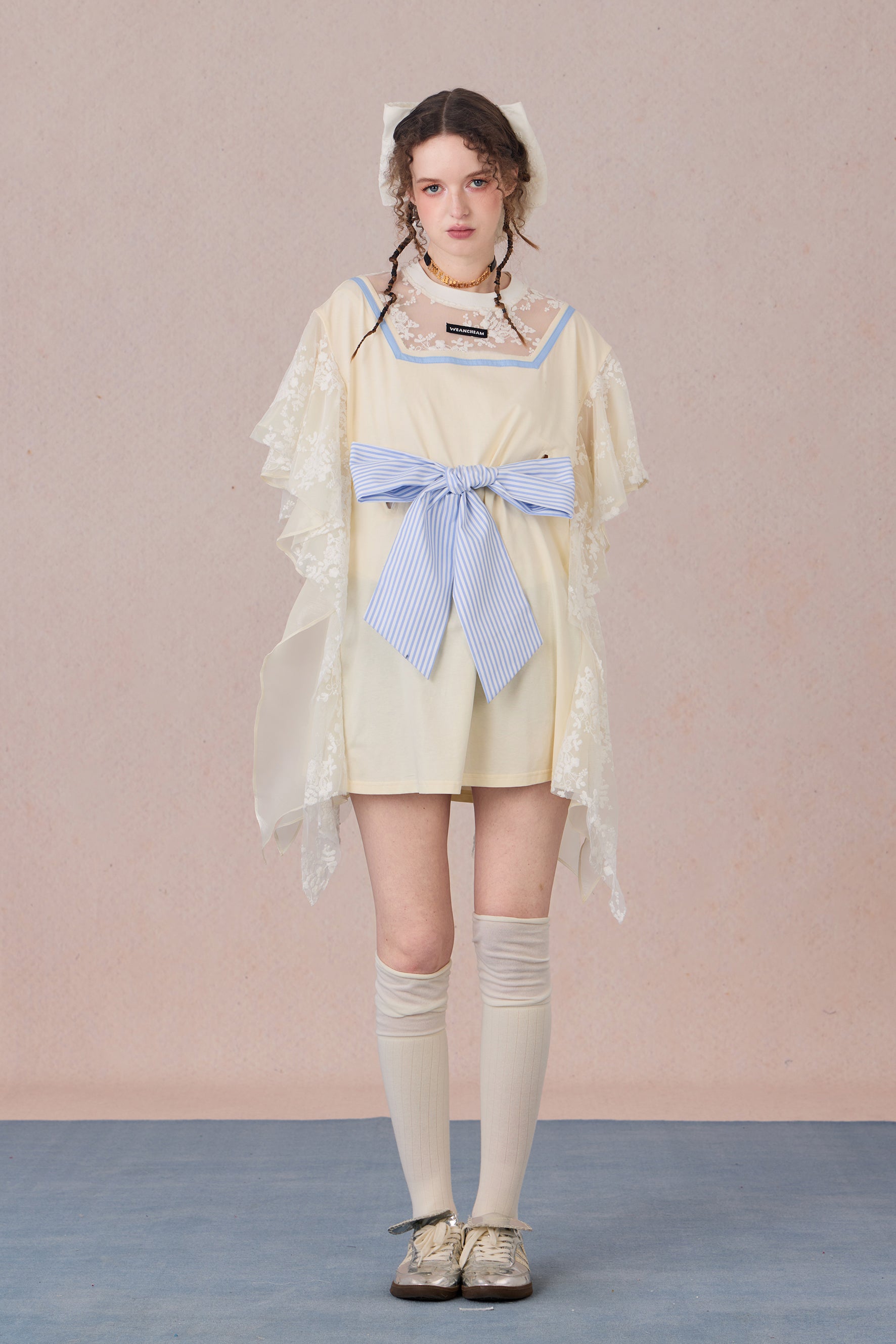 Fairycore-inspired dress with lace neckline and soft flowing silhouette