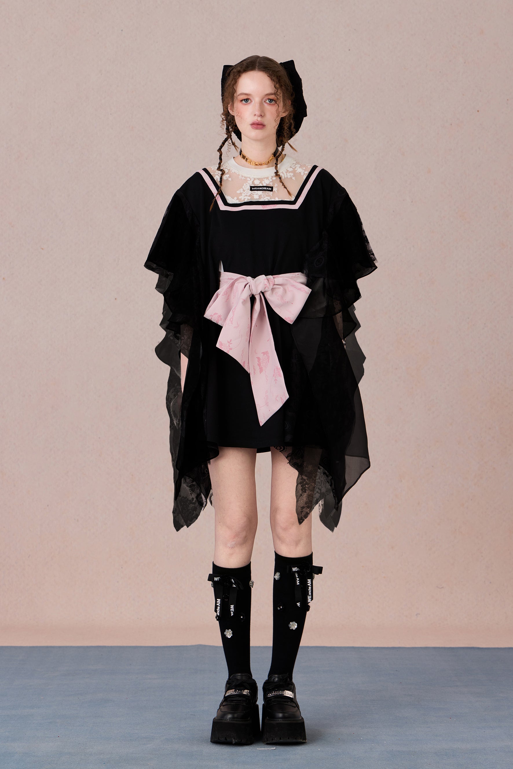 Fairycore-inspired dress with lace neckline and soft flowing silhouette
