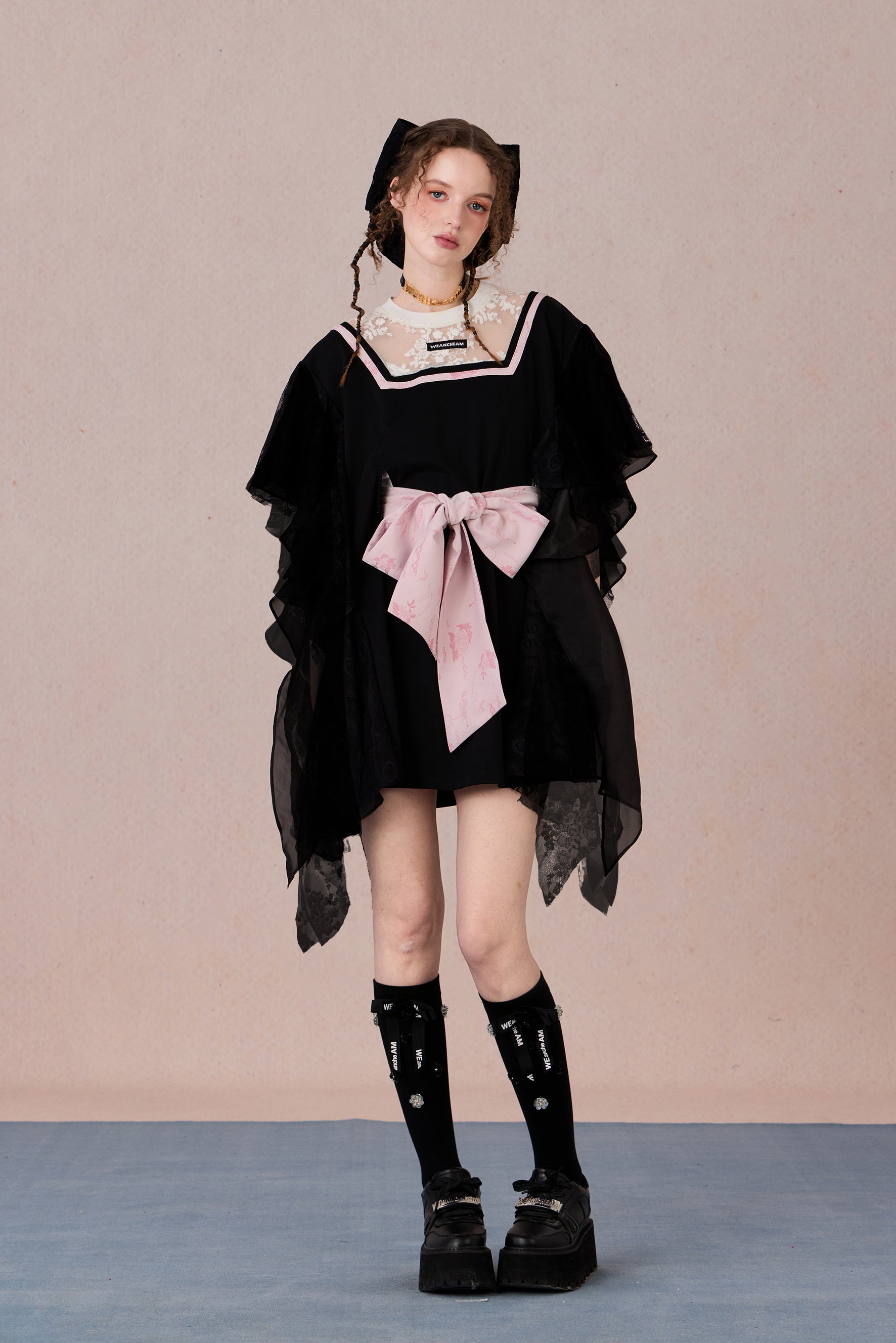 Fairycore-inspired dress with lace neckline and soft flowing silhouette