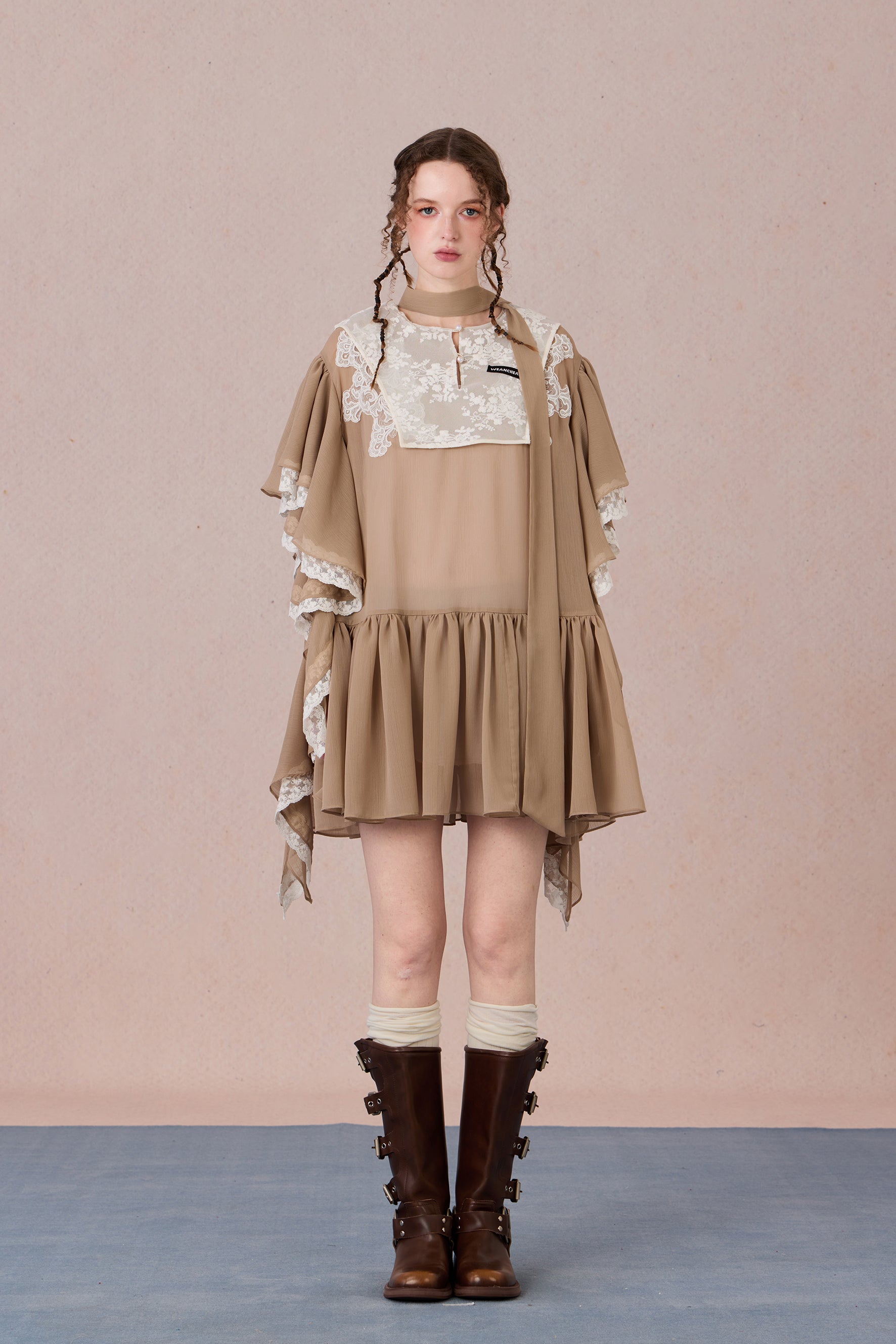 Model wearing layered chiffon dress with lace collage and short sleeves – WEANCHEAM