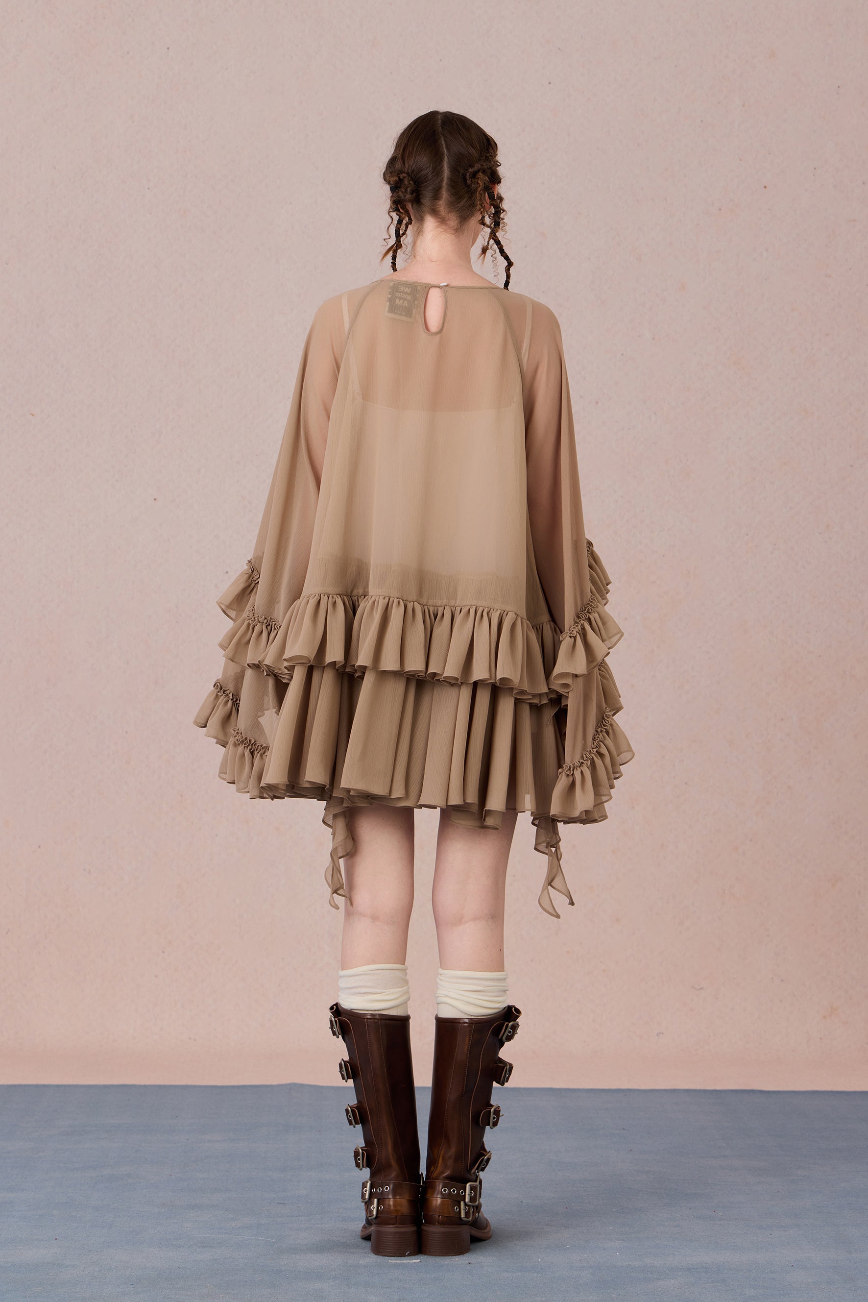 Model wearing vintage-inspired layered dress with sheer glow – WEANCHEAM