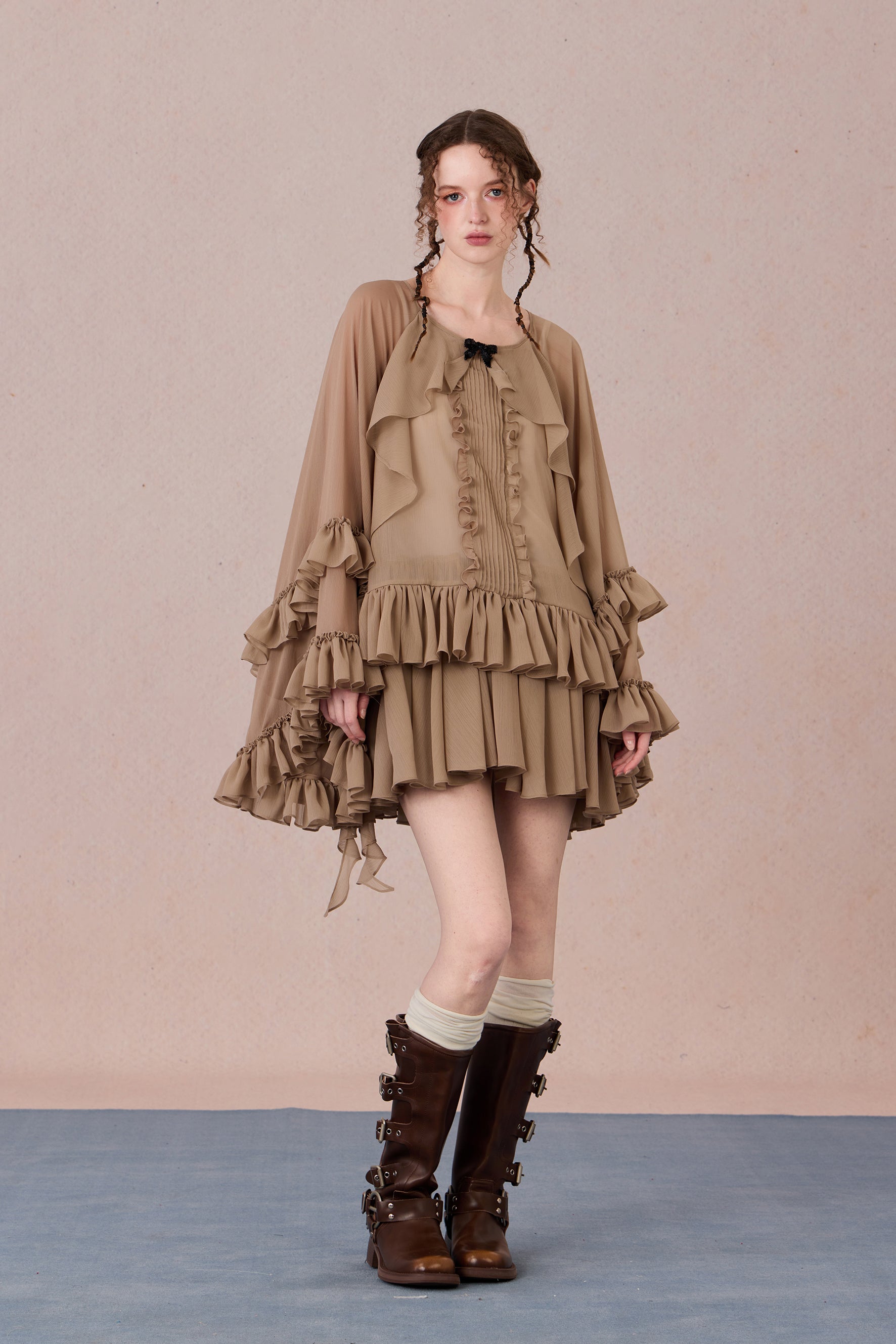 Model wearing vintage-inspired layered dress with sheer glow – WEANCHEAM
