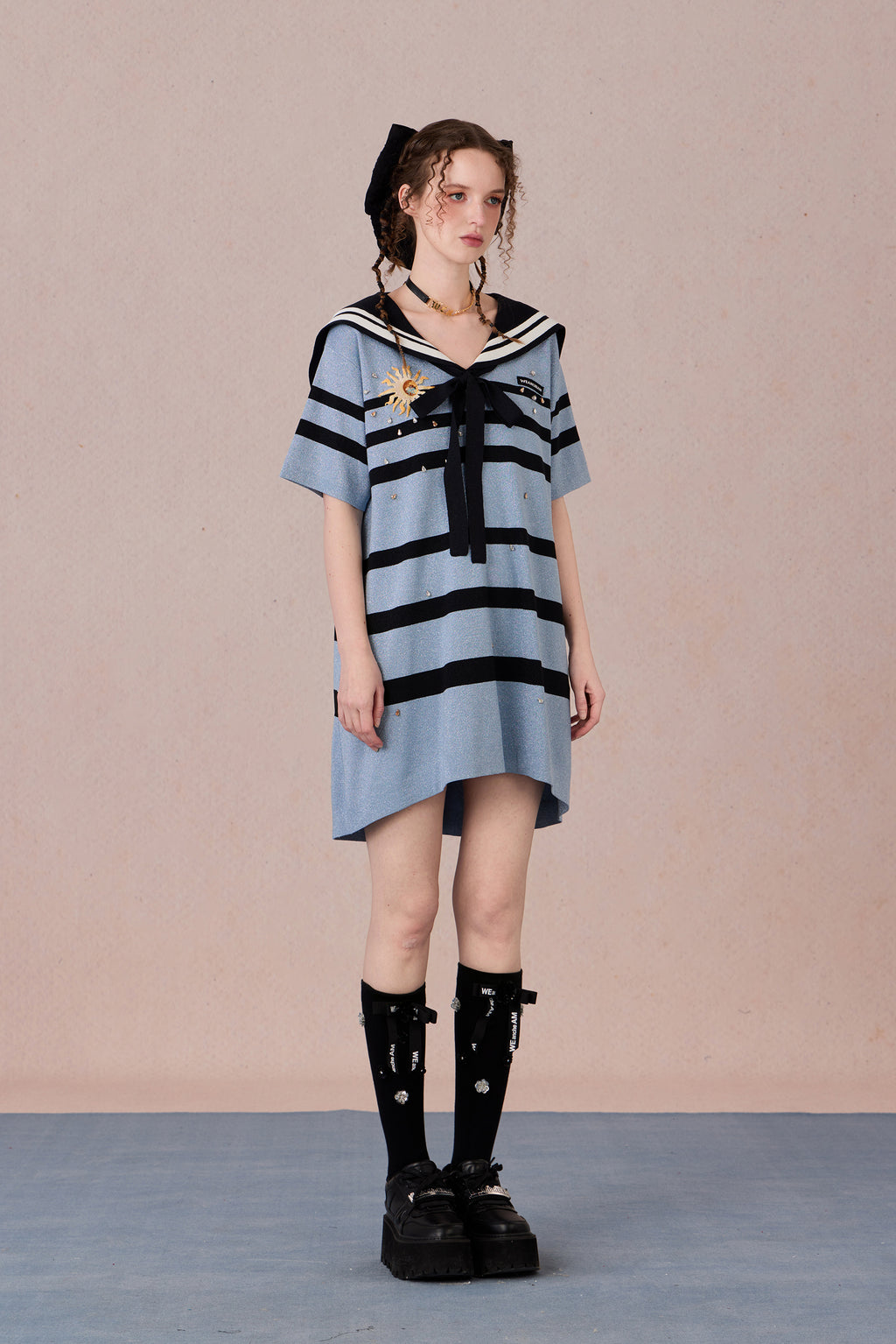 Model in nautical-style dress with embroidered bow and beadwork – WEANCHEAM