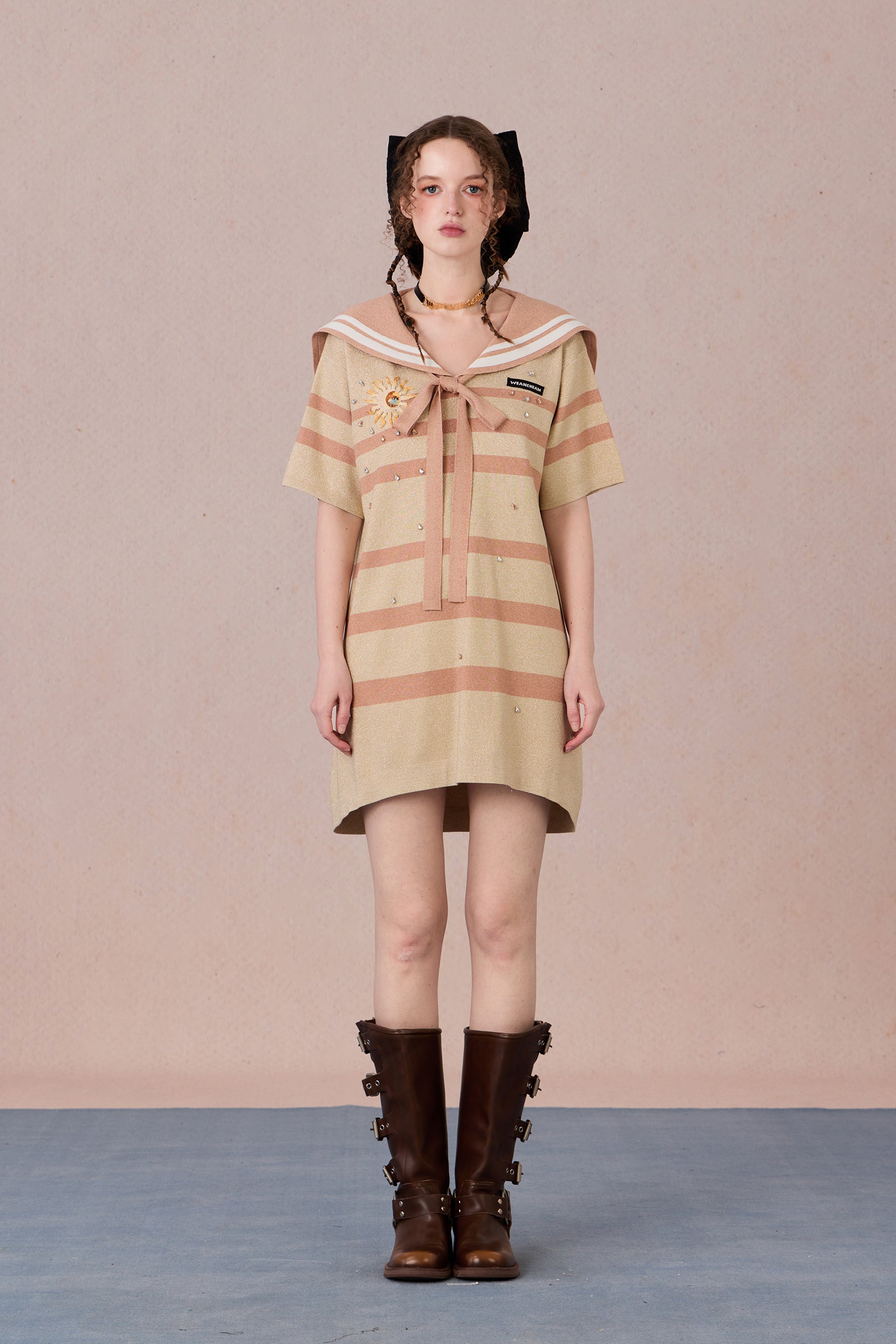 Model in nautical-style dress with embroidered bow and beadwork – WEANCHEAM