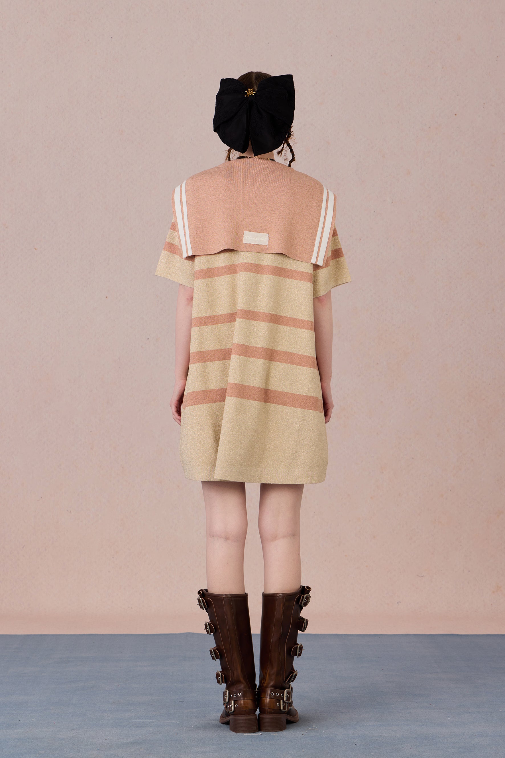Back view of breathable striped dress with silver-thread shimmer