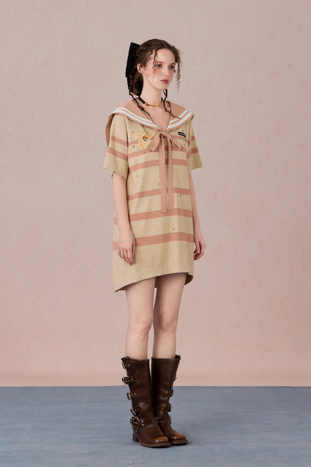Model in nautical-style dress with embroidered bow and beadwork – WEANCHEAM