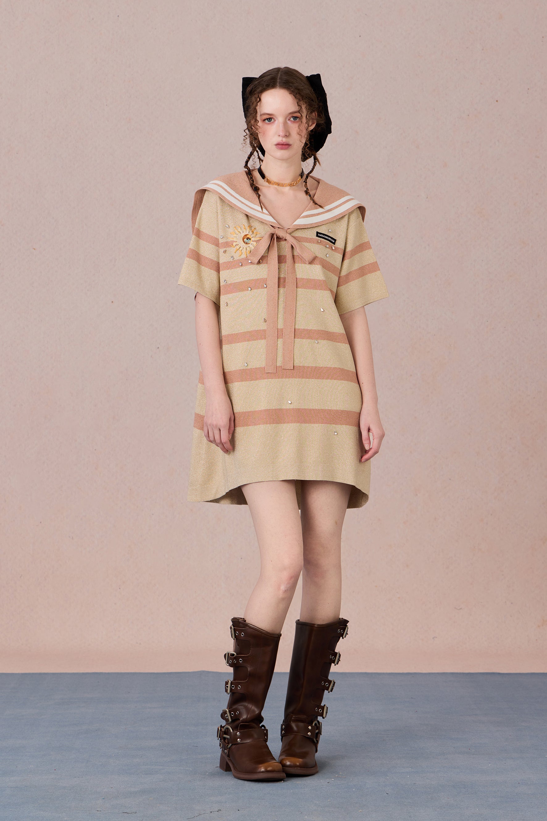 Model in nautical-style dress with embroidered bow and beadwork – WEANCHEAM