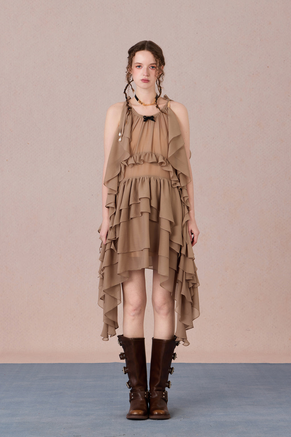 Model in fluttering battle-damaged lace dress with ruffled layers – WEANCHEAM