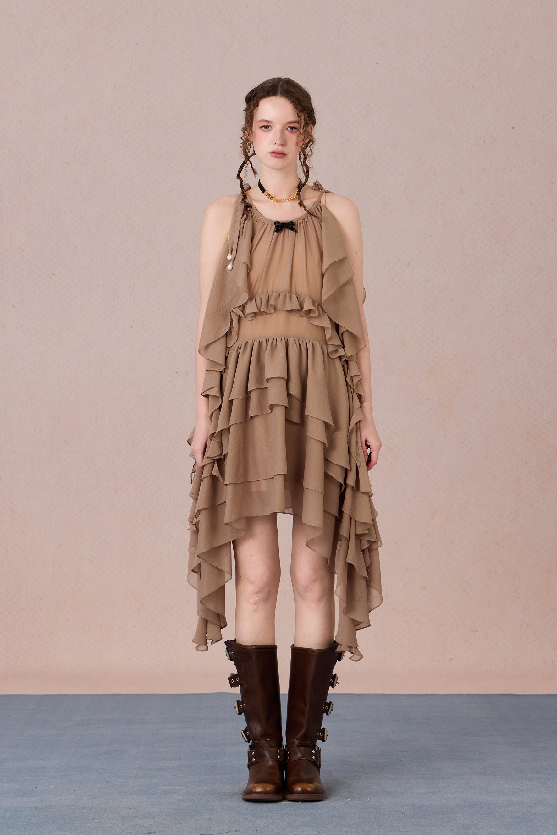 Model in fluttering battle-damaged lace dress with ruffled layers – WEANCHEAM