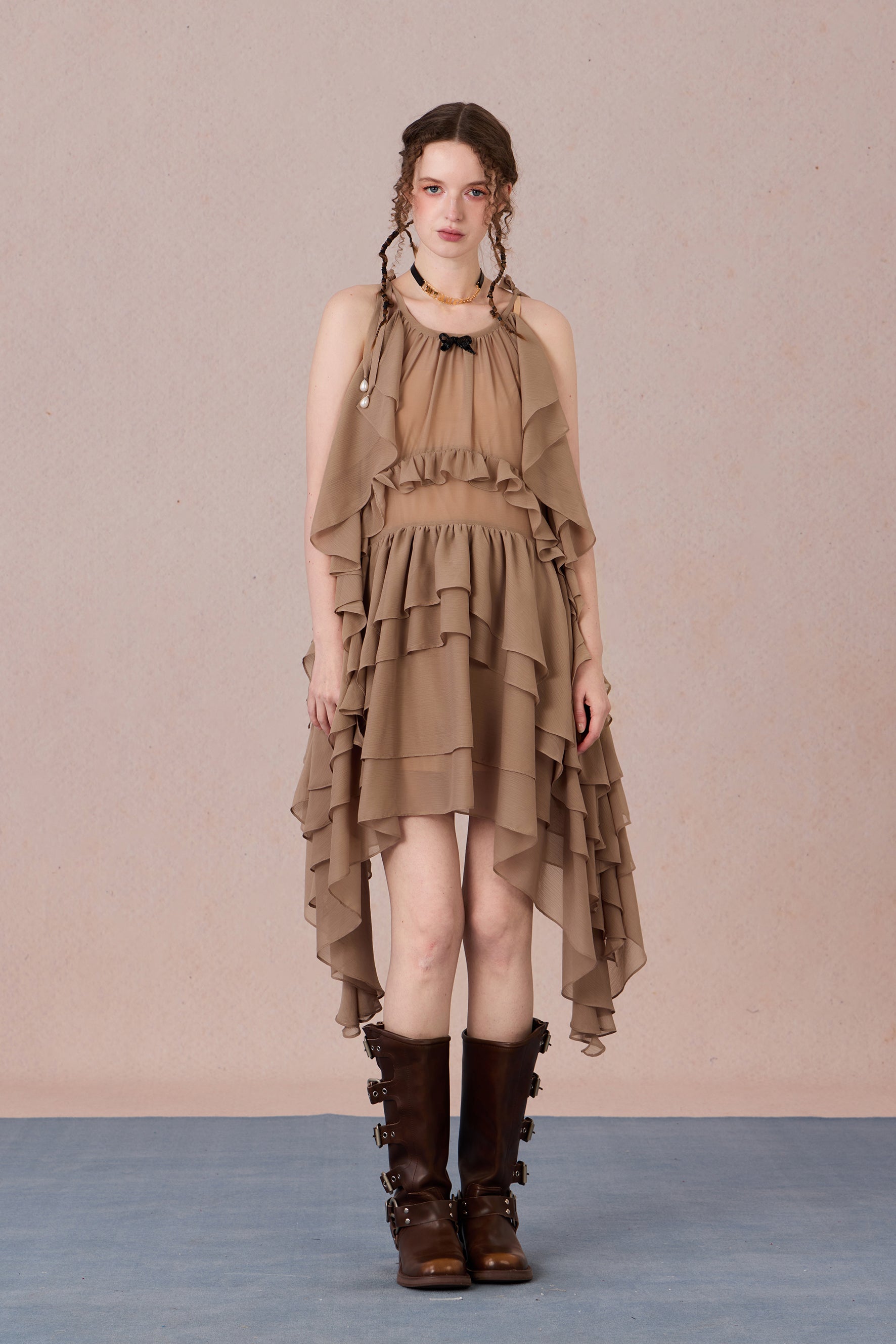 Model in fluttering battle-damaged lace dress with ruffled layers – WEANCHEAM