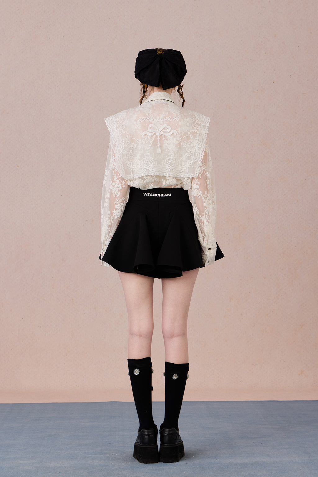 Back view of classic WEANCHEAM 3-in-1 shirt in motion