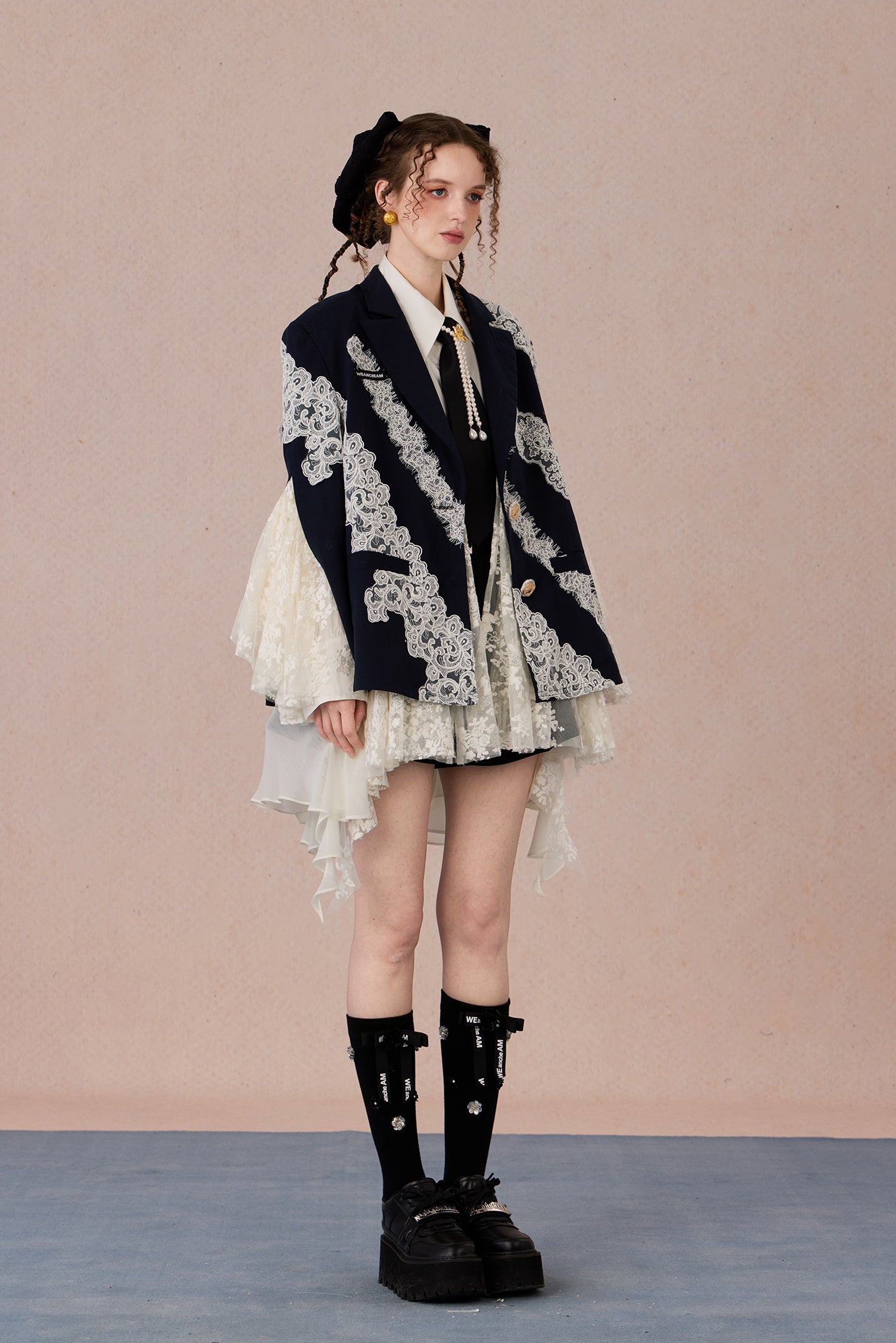 Linen blend tailored jacket with lace applique and irregular hemline