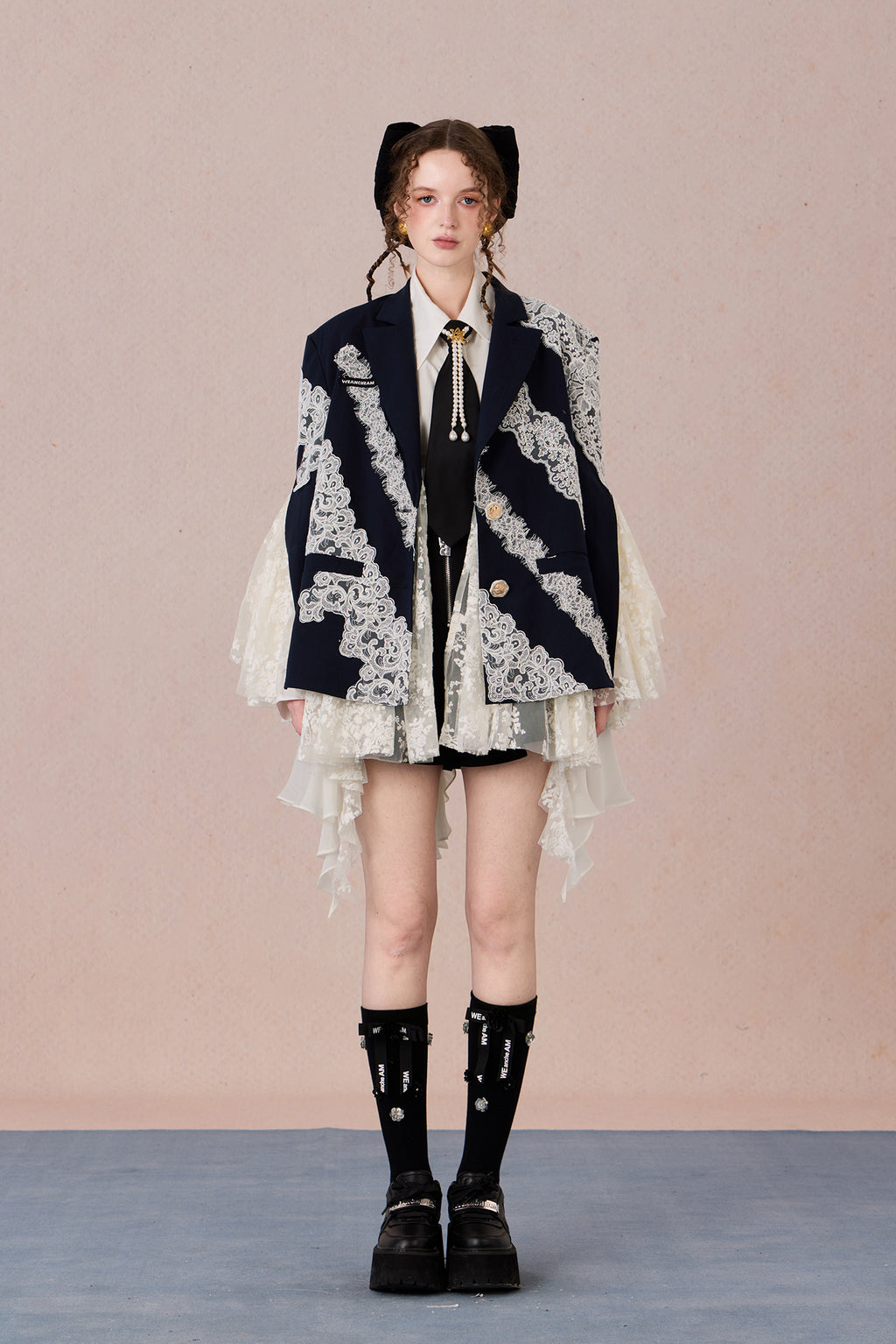 Linen blend tailored jacket with lace applique and irregular hemline