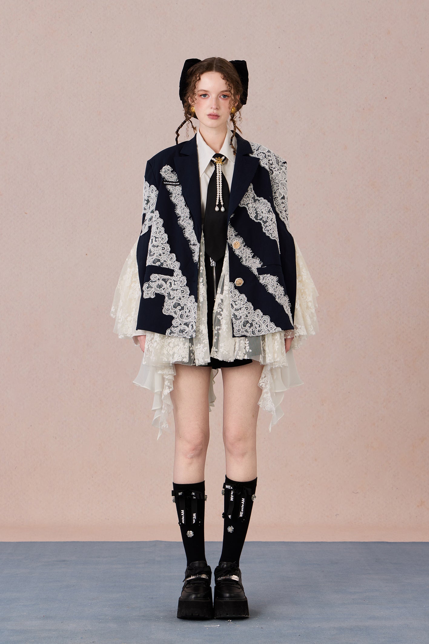 Linen blend tailored jacket with lace applique and irregular hemline