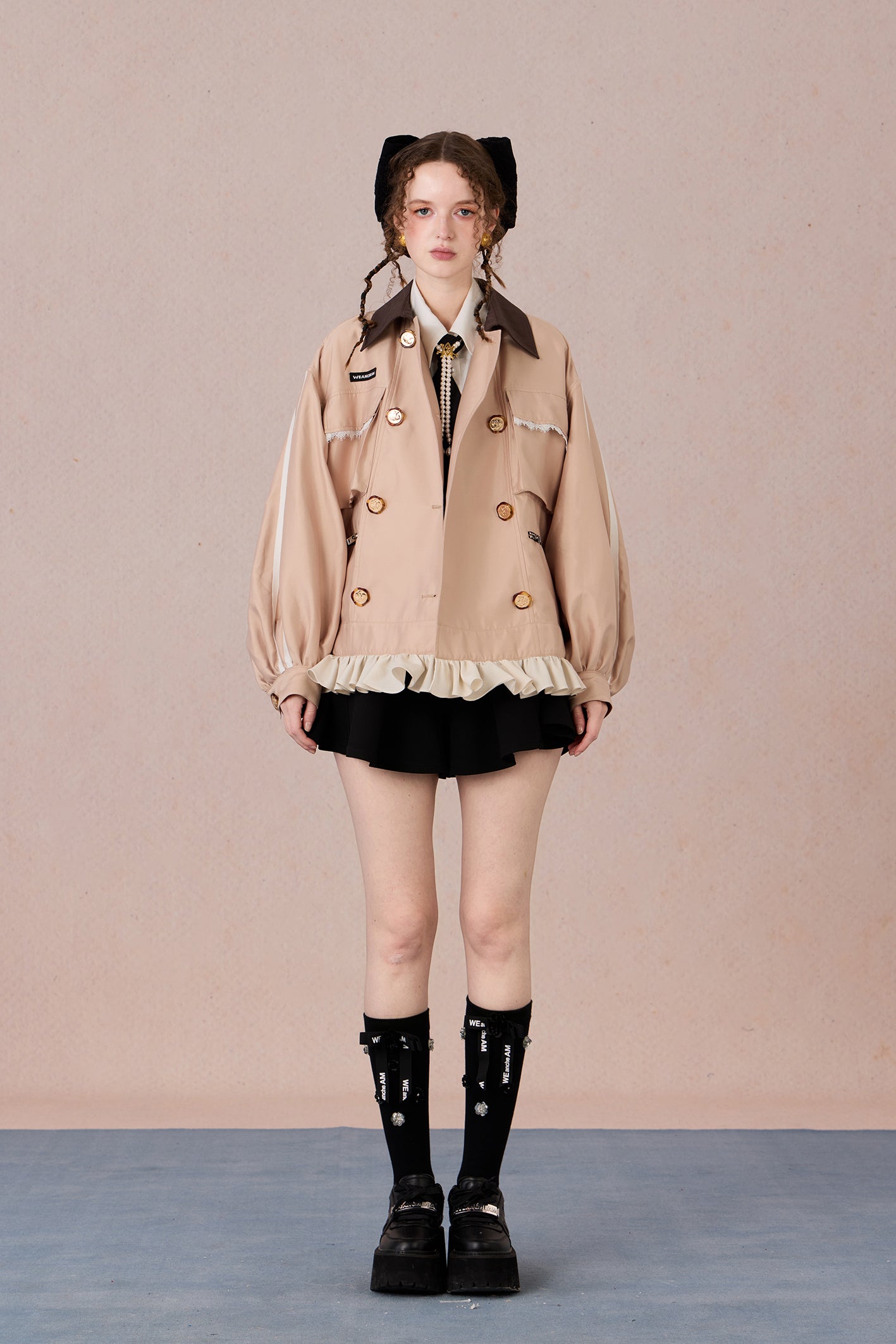 Romantic lace blazer with layered texture and loose fit silhouette