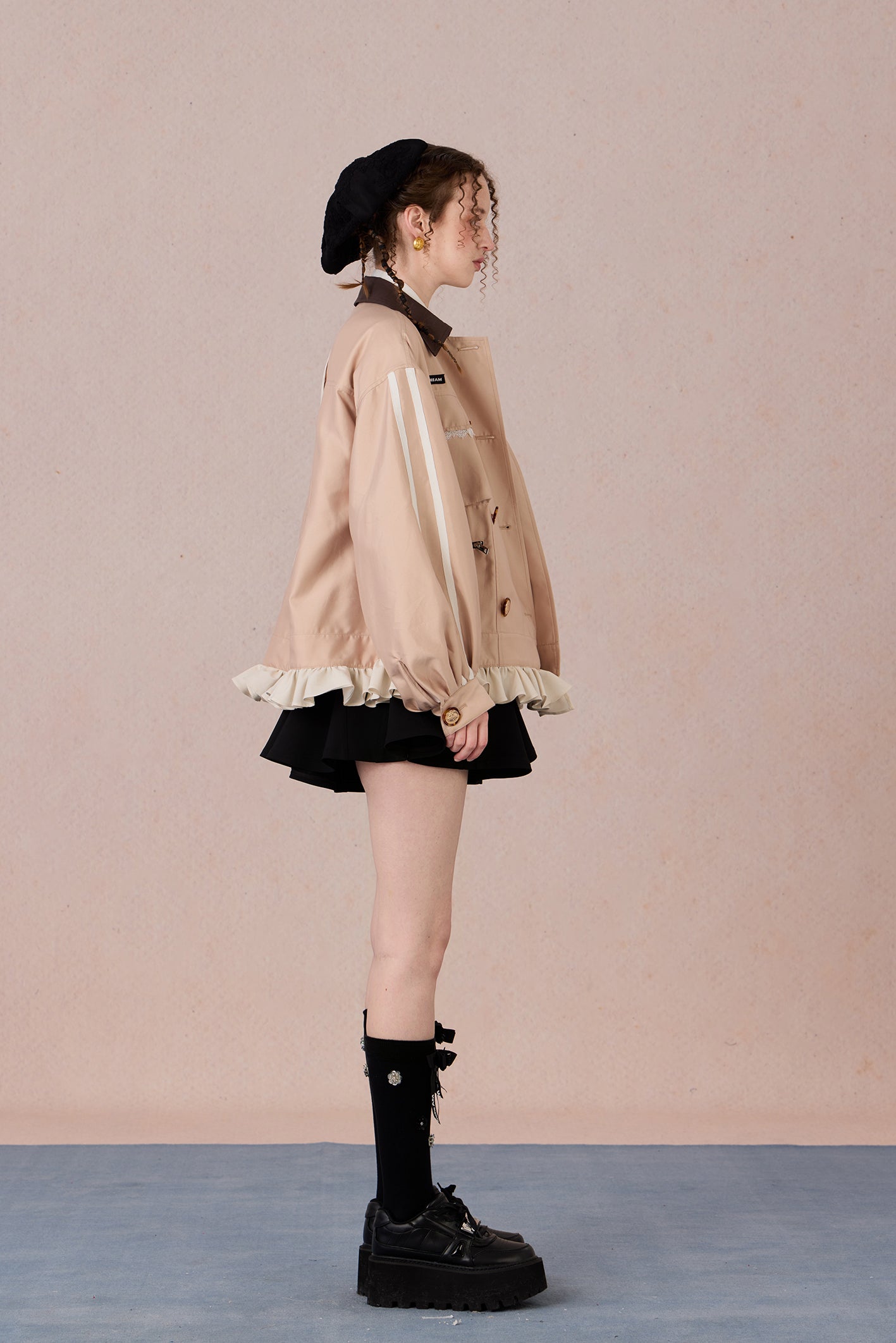 Romantic lace blazer with layered texture and loose fit silhouette