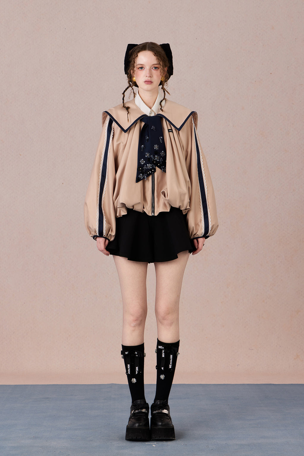 Romantic lace coat styled with skirt for spring garden look