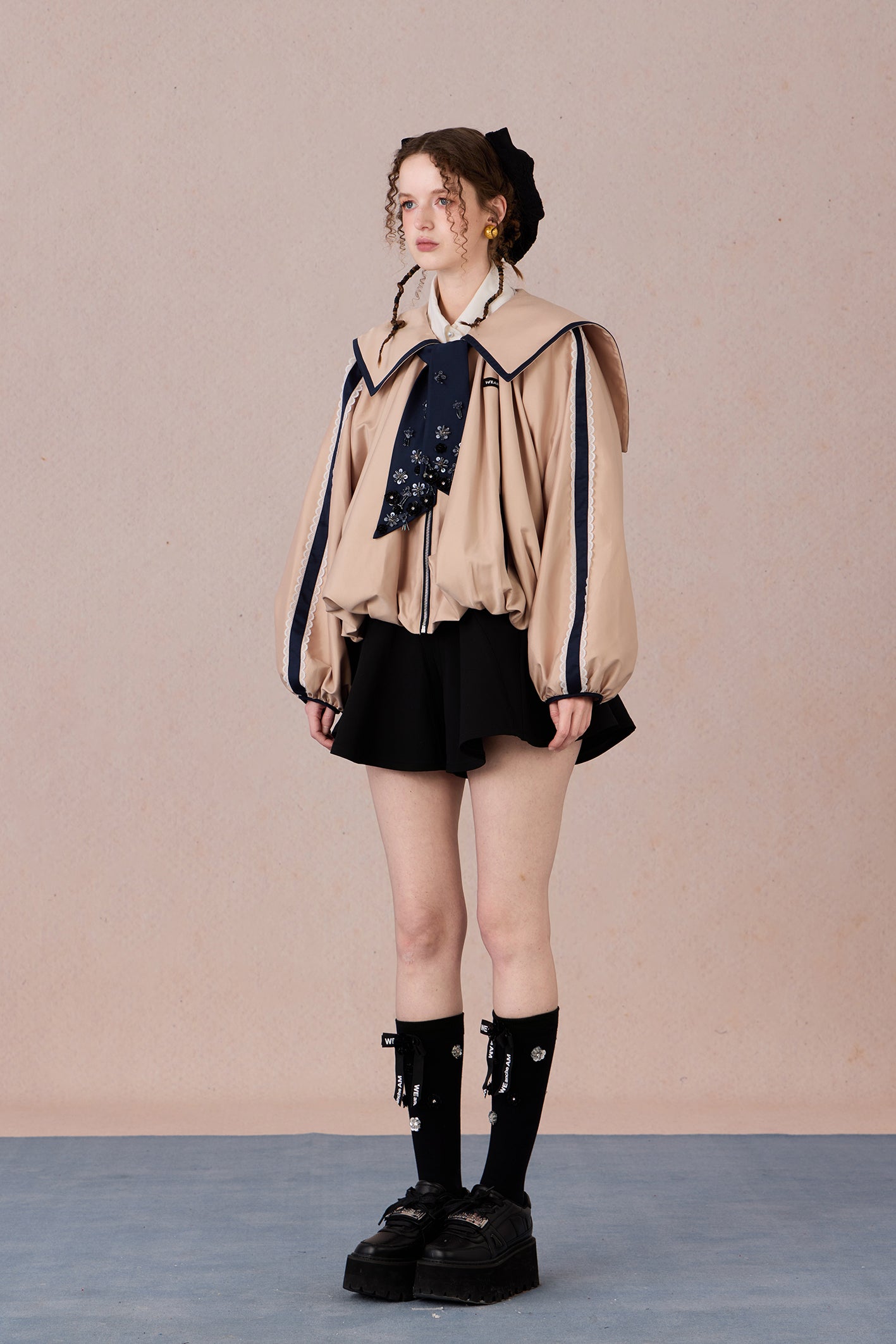 Romantic lace coat styled with skirt for spring garden look