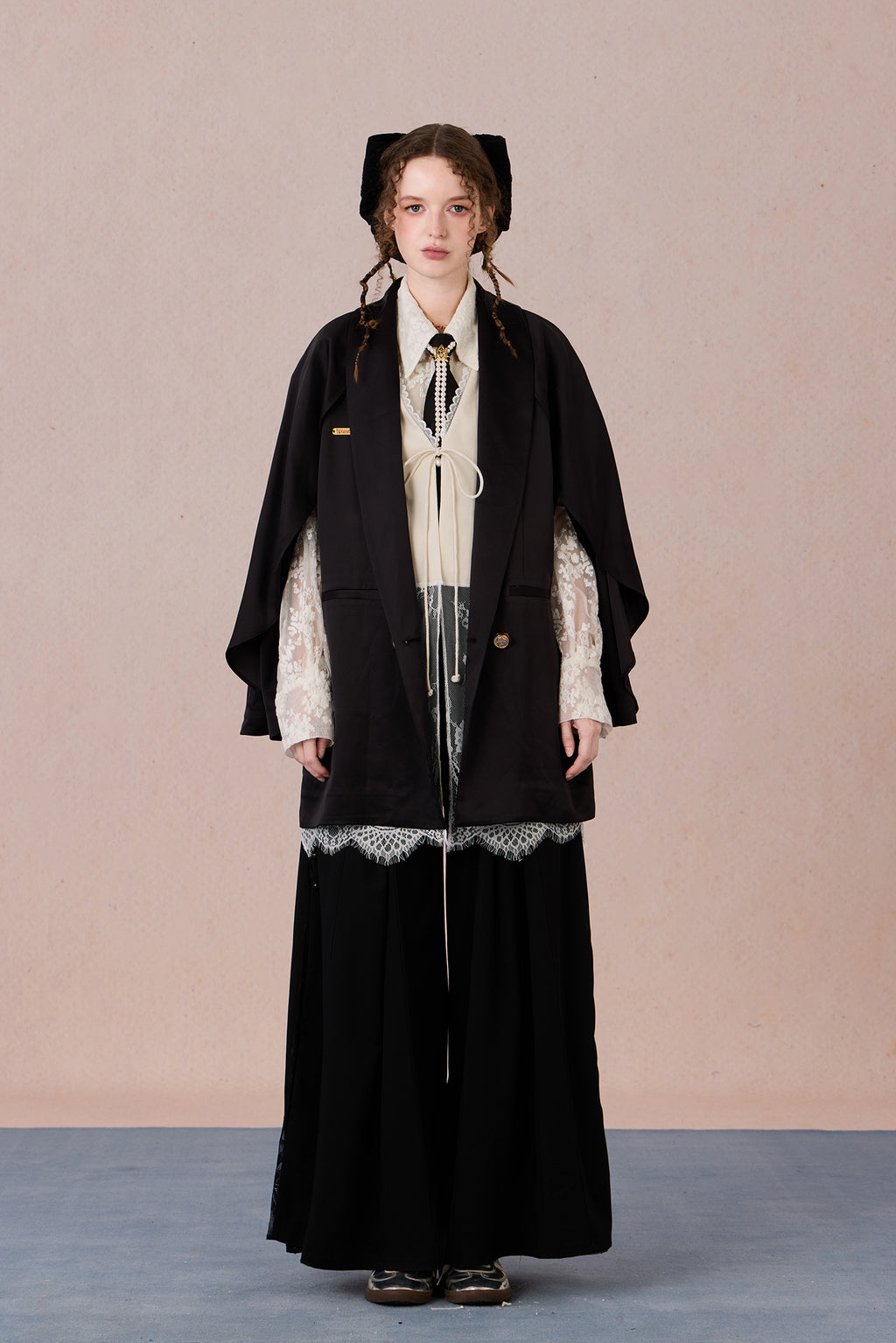 Layered lightweight jacket with lace-trimmed sleeves and medium length