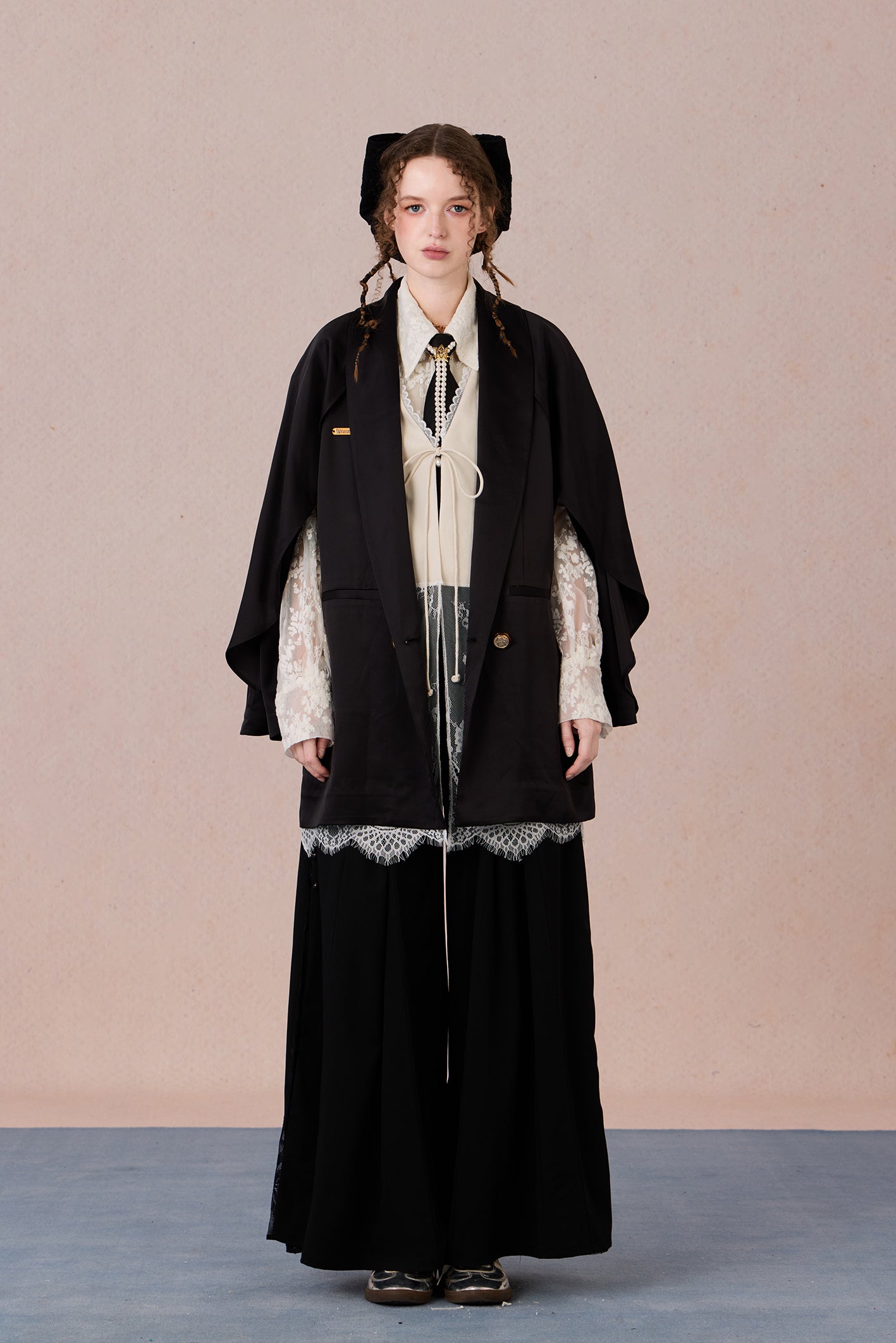 Layered lightweight jacket with lace-trimmed sleeves and medium length