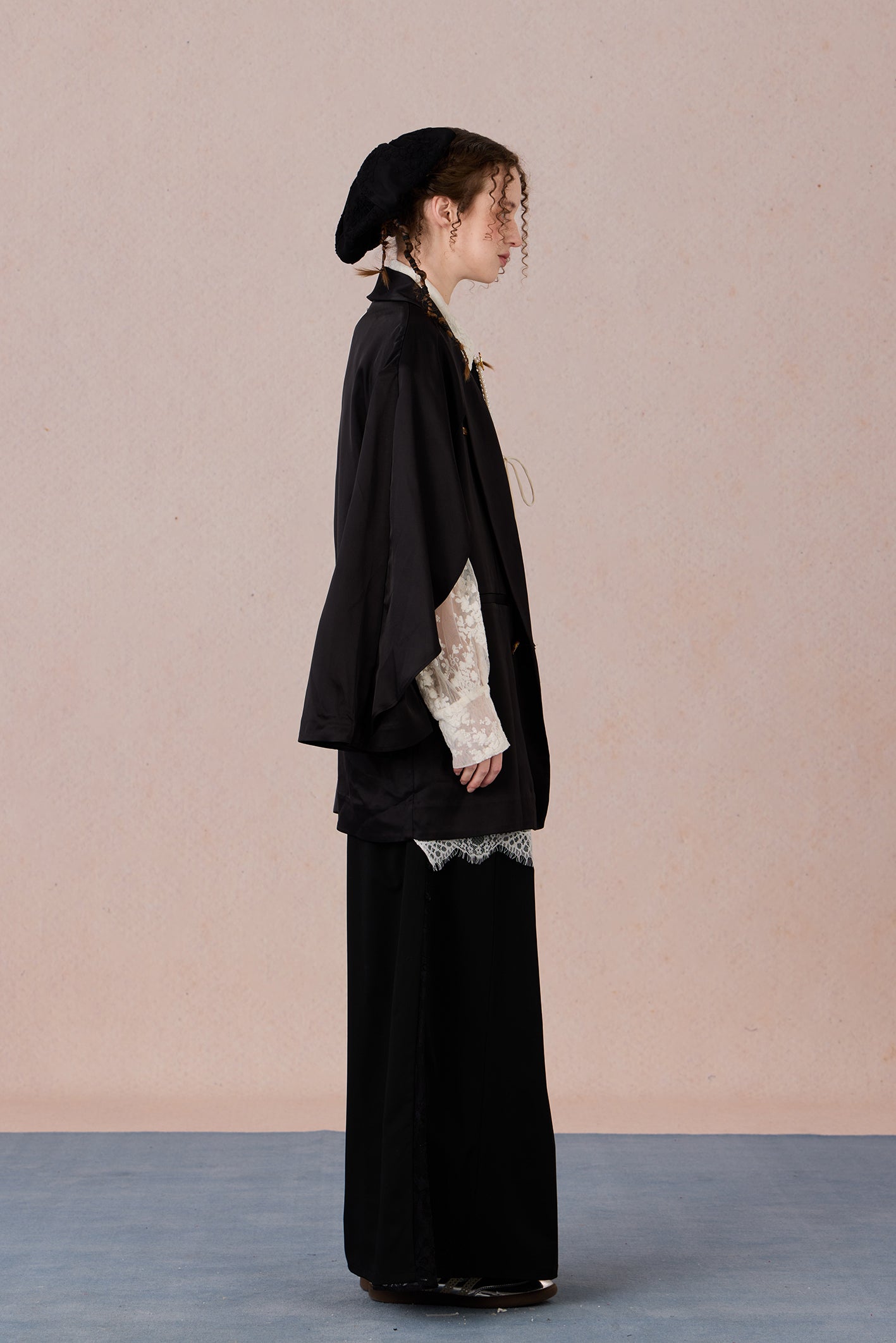 Layered lightweight jacket with lace-trimmed sleeves and medium length