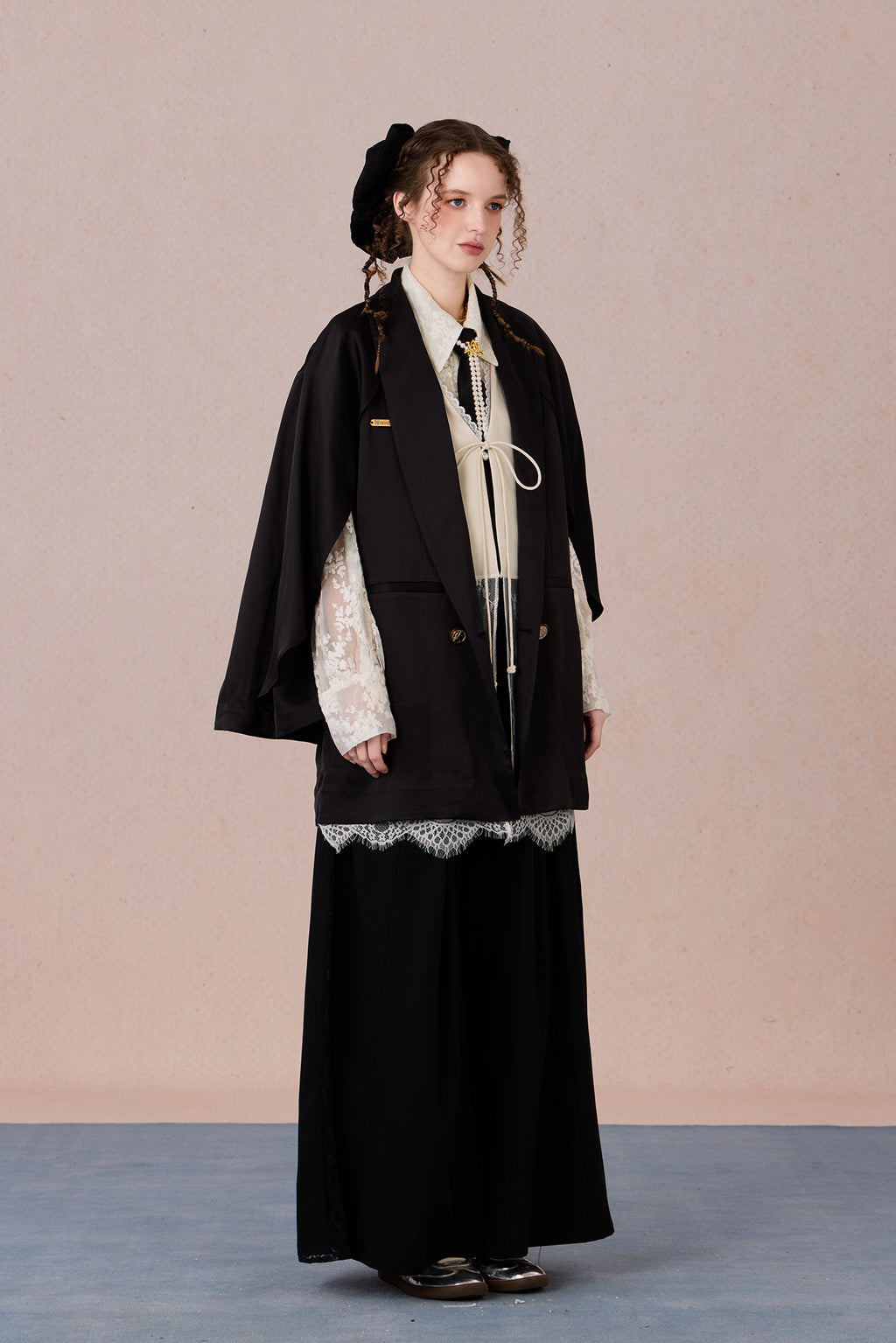 Layered lightweight jacket with lace-trimmed sleeves and medium length