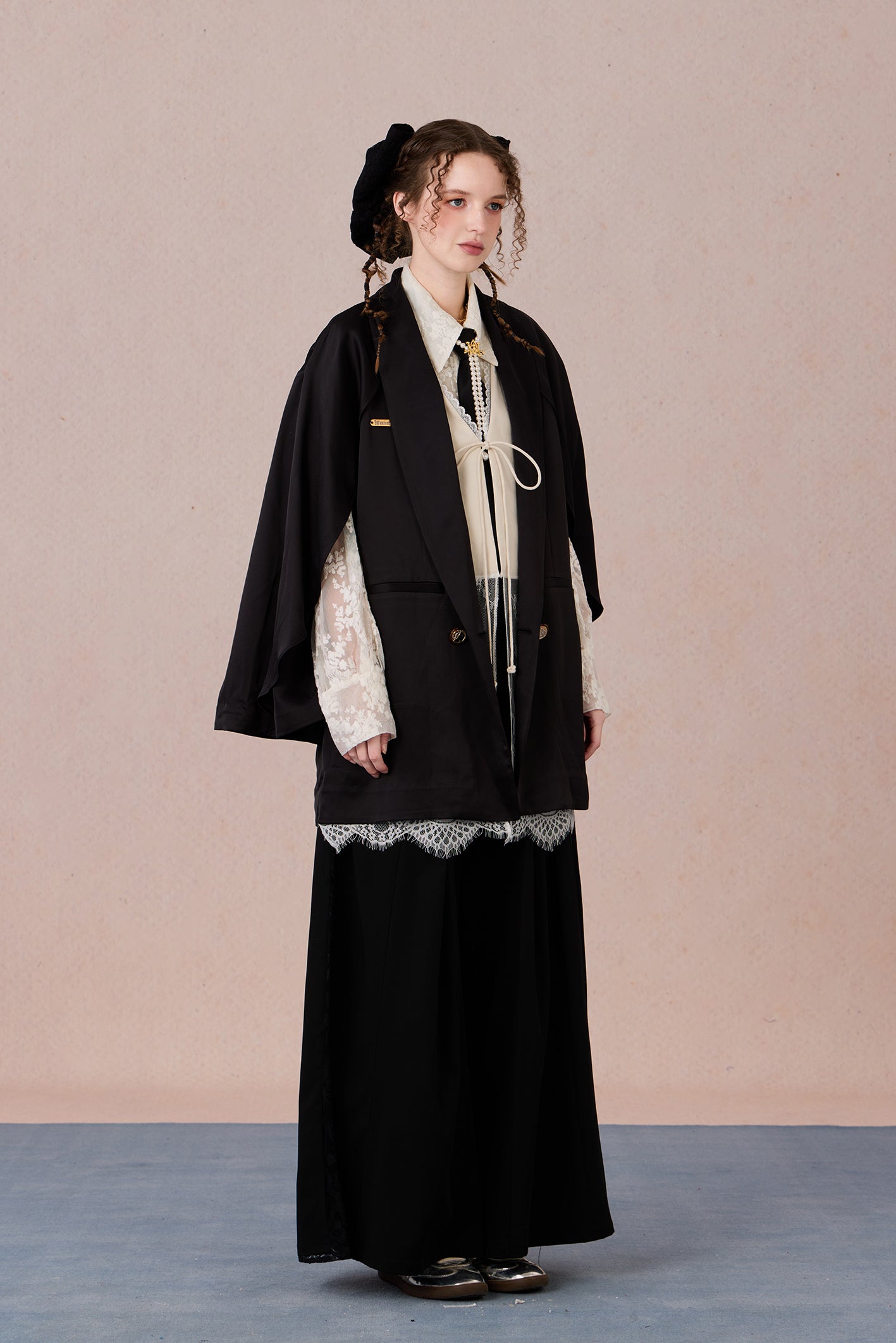 Layered lightweight jacket with lace-trimmed sleeves and medium length