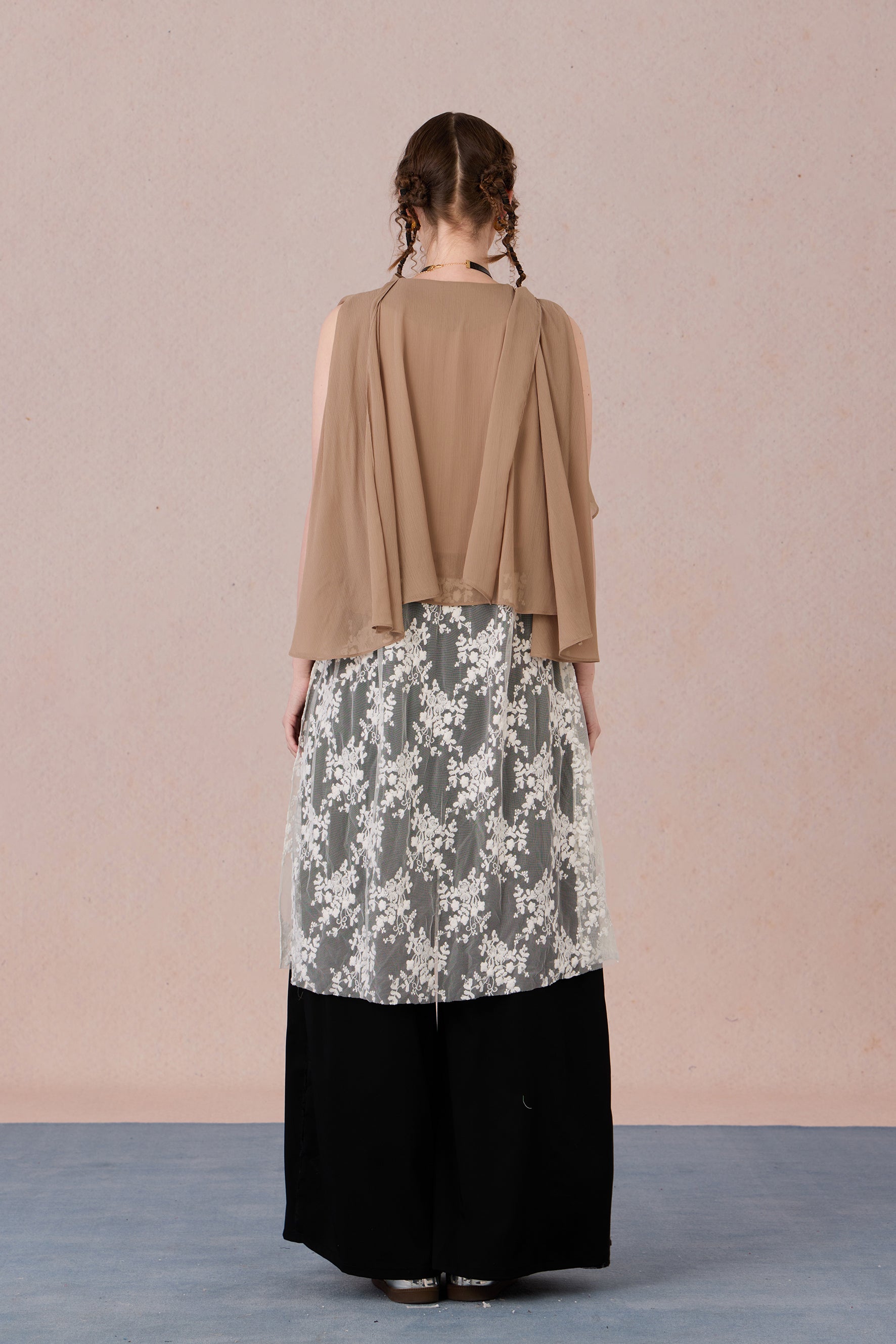 Back view of lightweight sheer-hem blouse with relaxed drape – WEANCHEAM