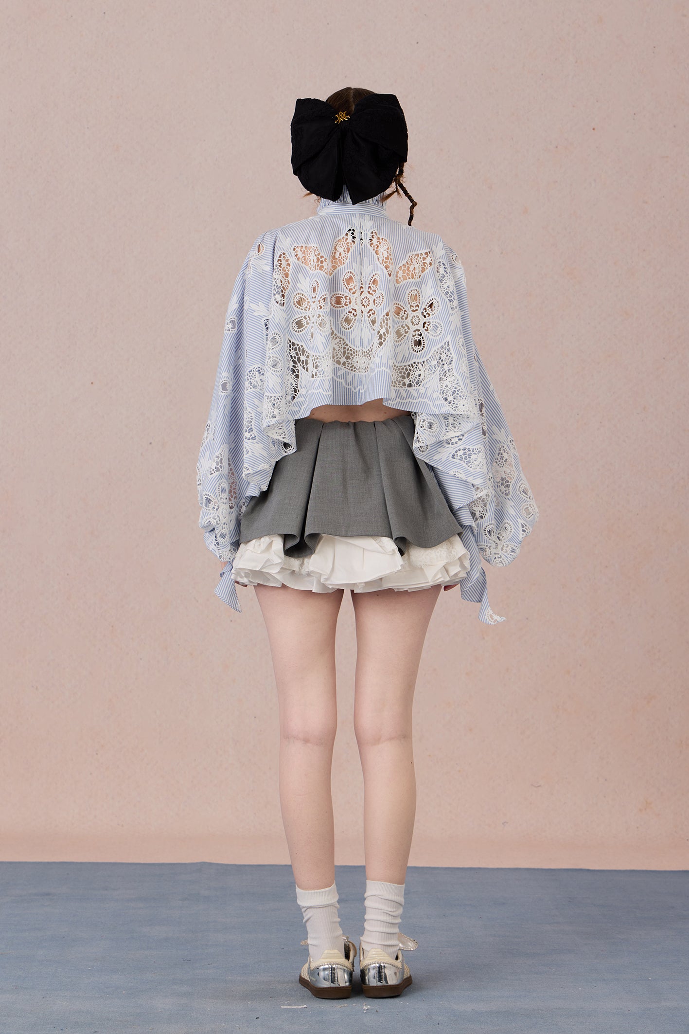 Flowing romantic shirt with beaded floral details and ruffled cuffs
