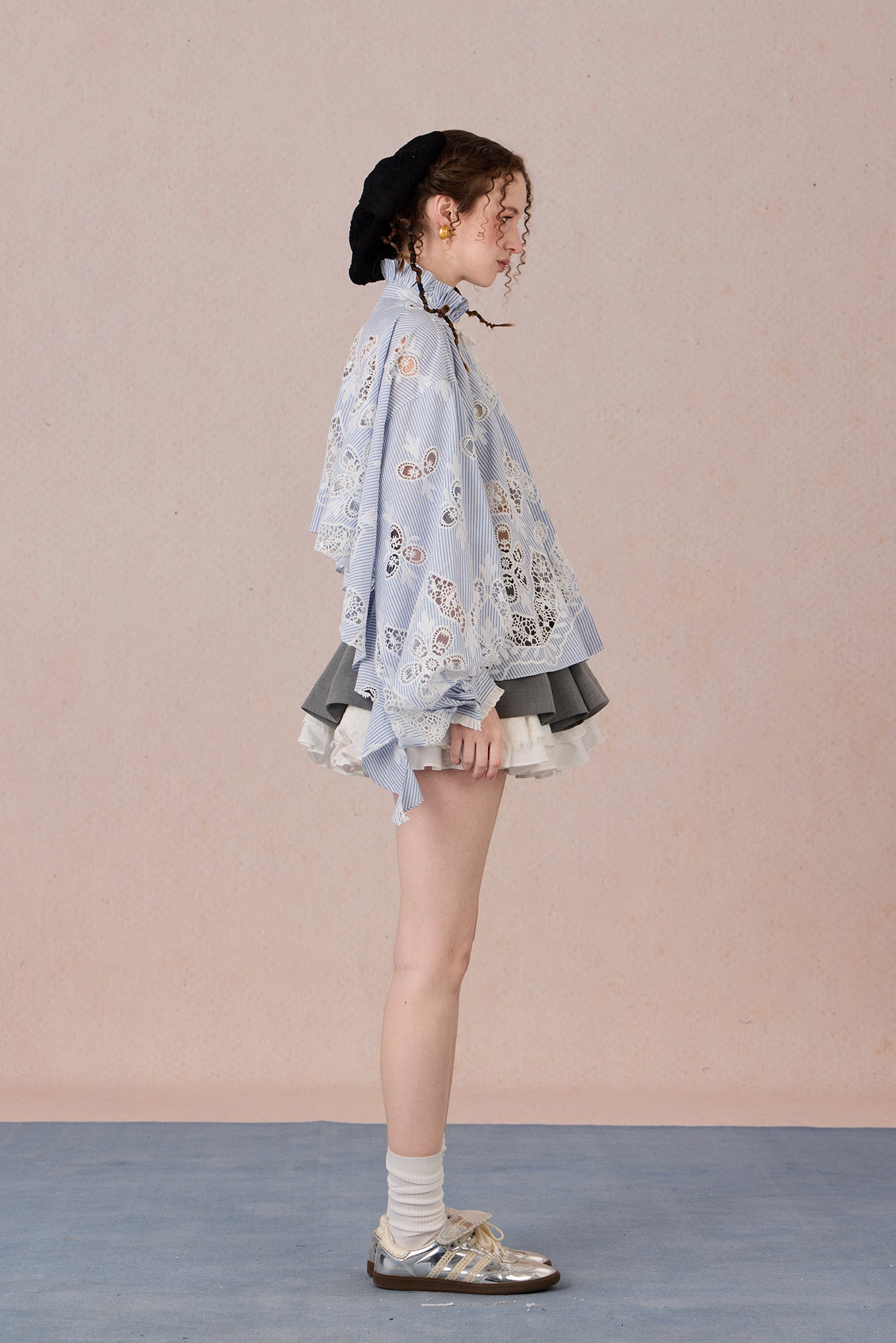 Flowing romantic shirt with beaded floral details and ruffled cuffs