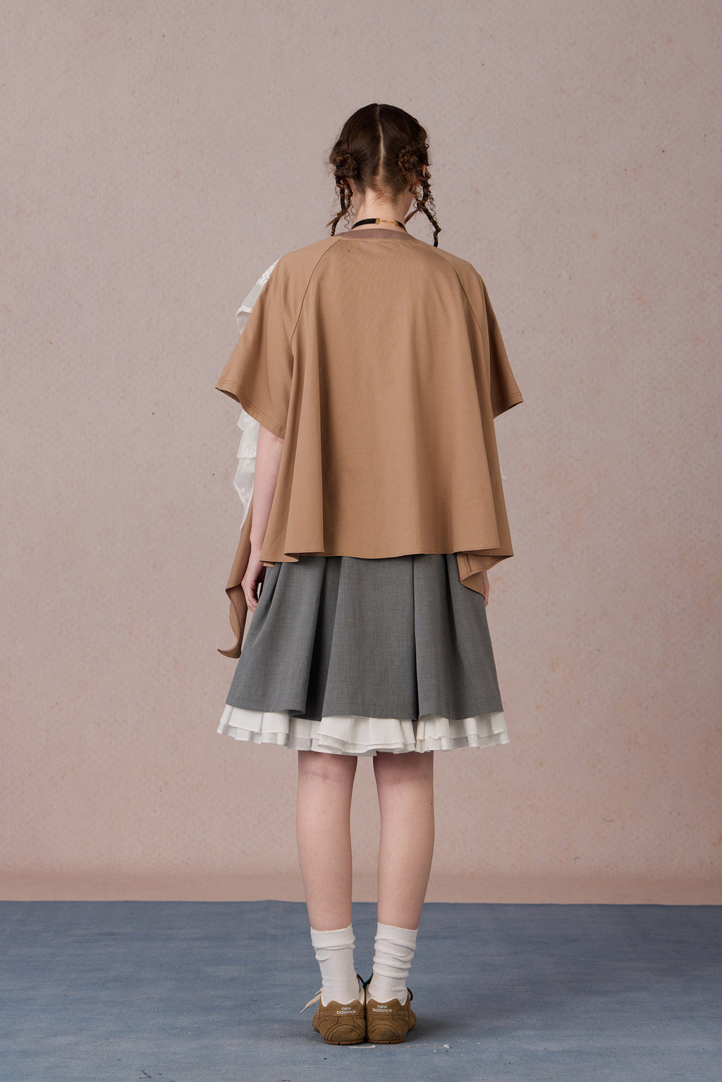 Feminine streetwear tee with drop shoulder and flowy back