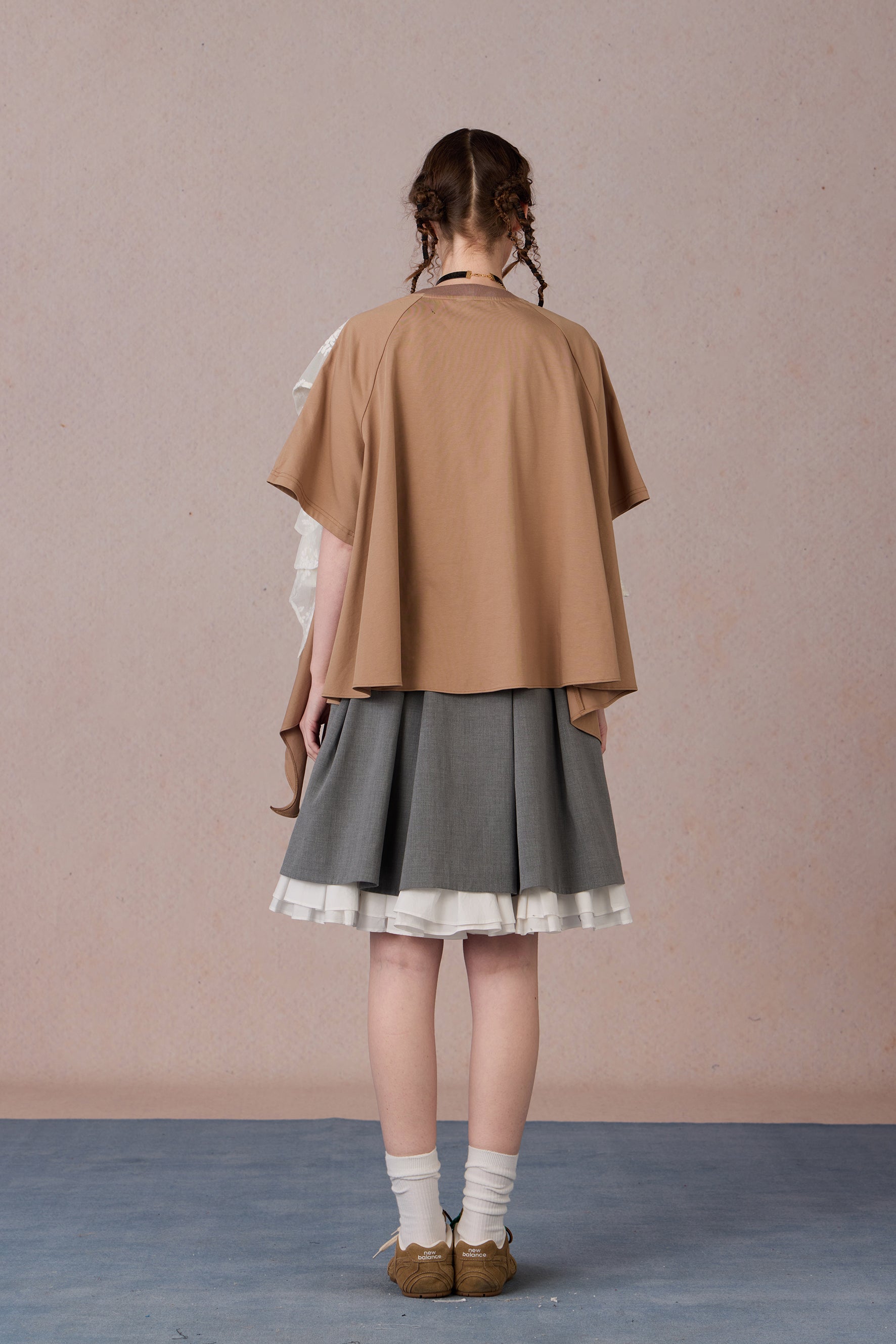 Feminine streetwear tee with drop shoulder and flowy back