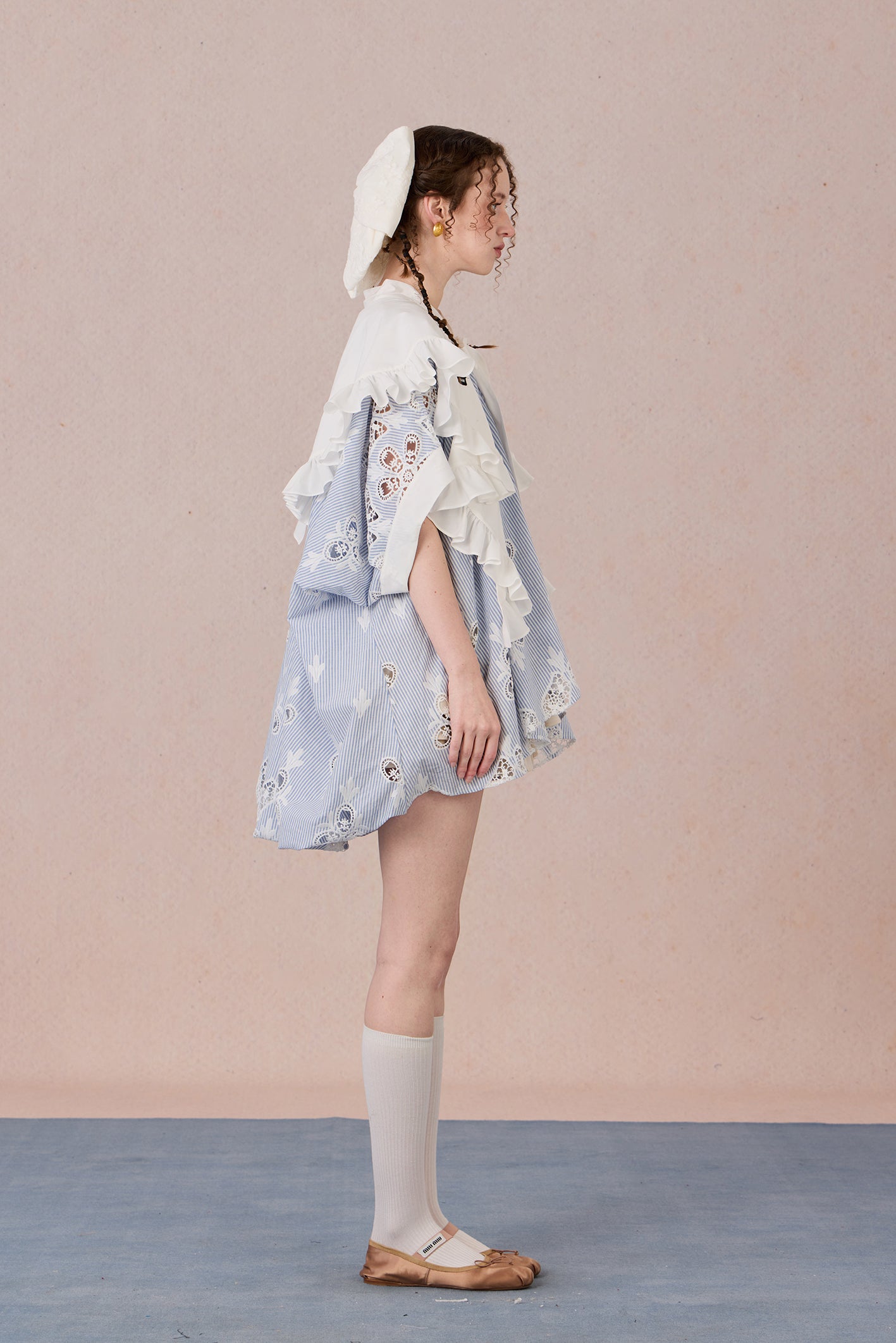Flowing robe-style layering jacket with pearl sheen and soft lapels