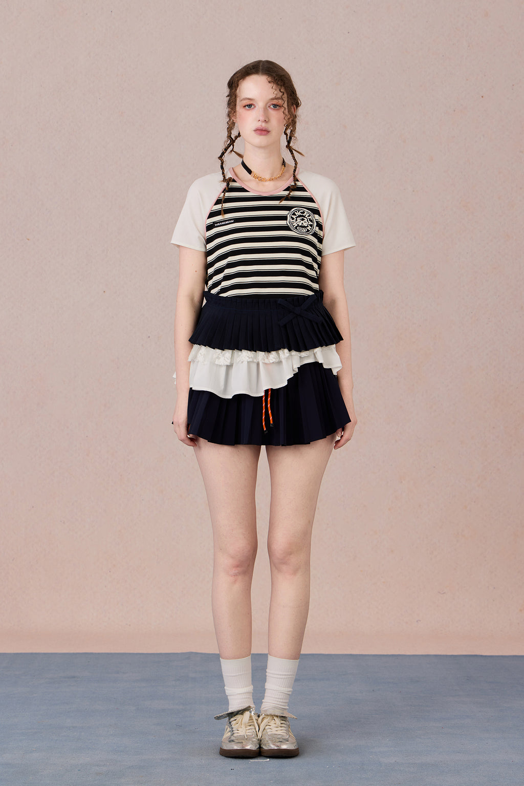 Asymmetrical cotton top with lace trim and layered textures
