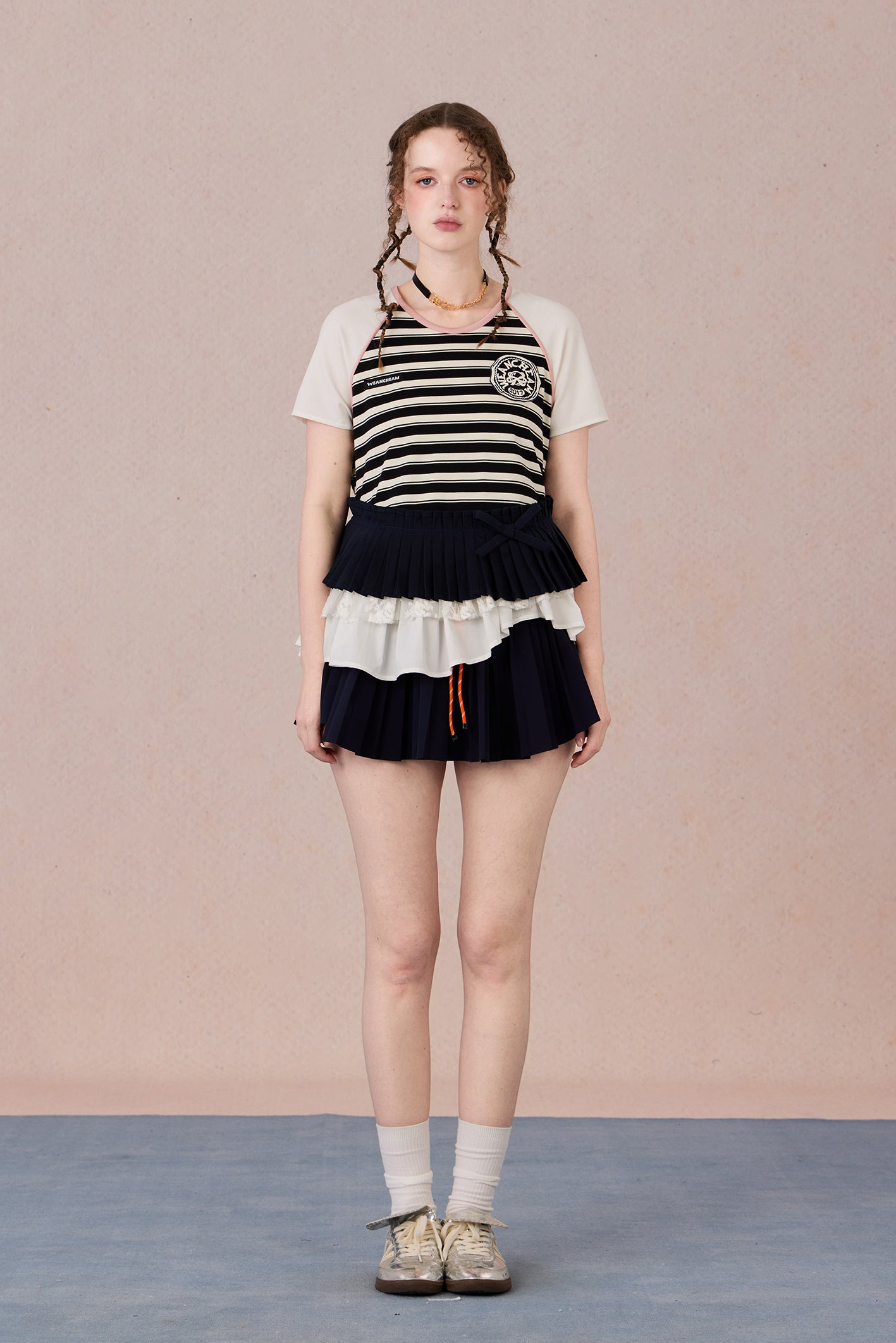 Asymmetrical cotton top with lace trim and layered textures