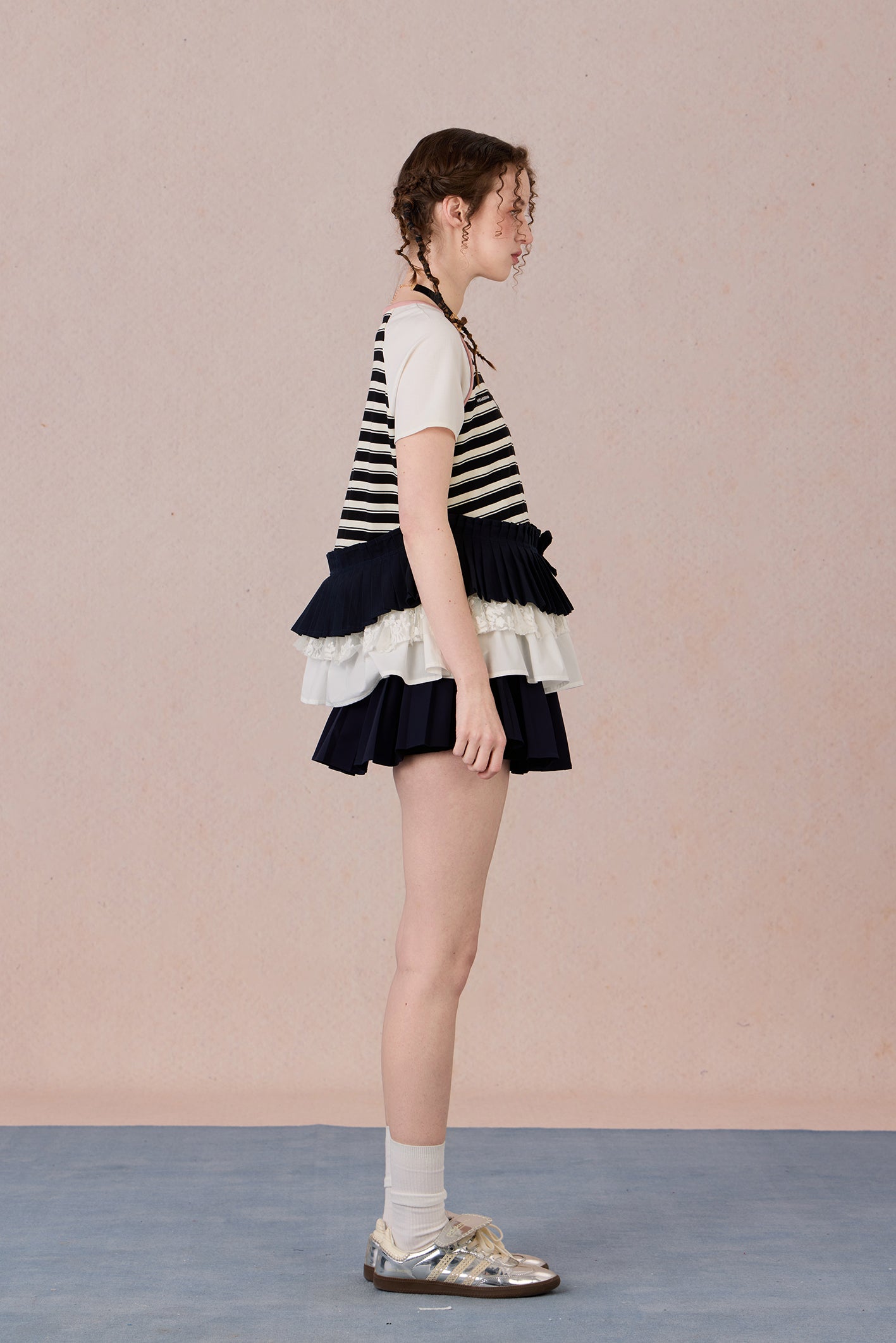 Asymmetrical cotton top with lace trim and layered textures