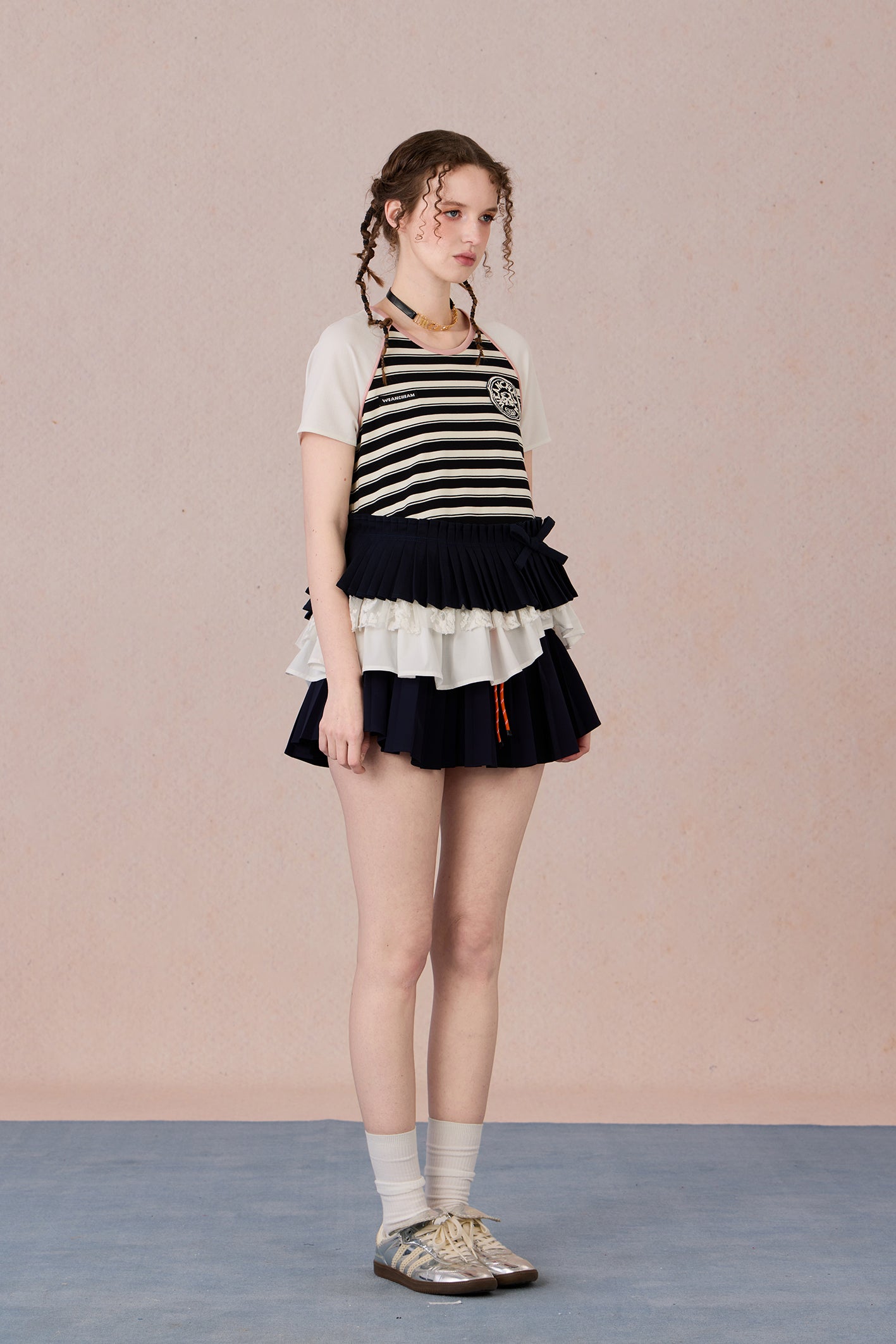 Asymmetrical cotton top with lace trim and layered textures