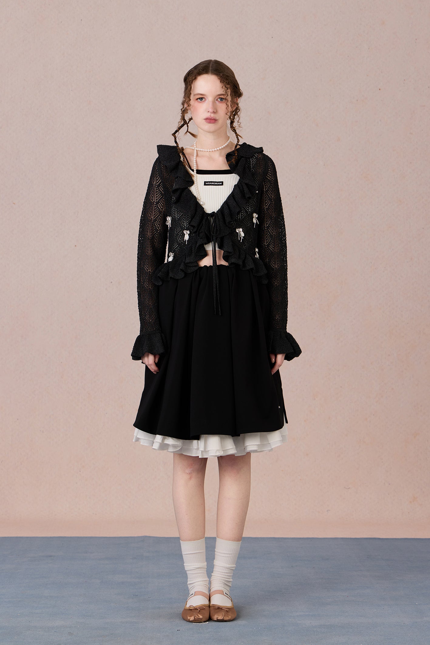 Feminine spring knit jacket styled with skirt
