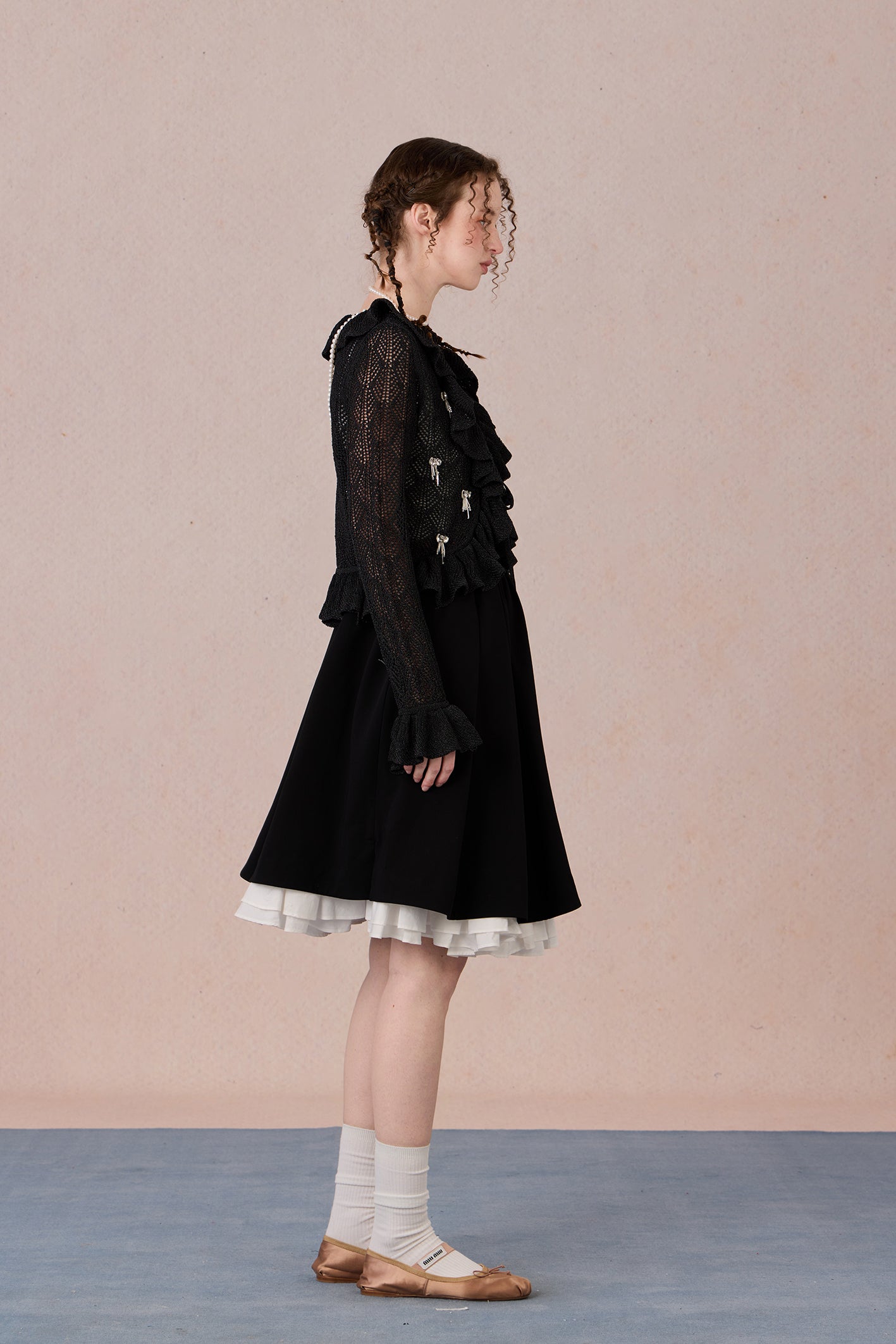 Feminine spring knit jacket styled with skirt