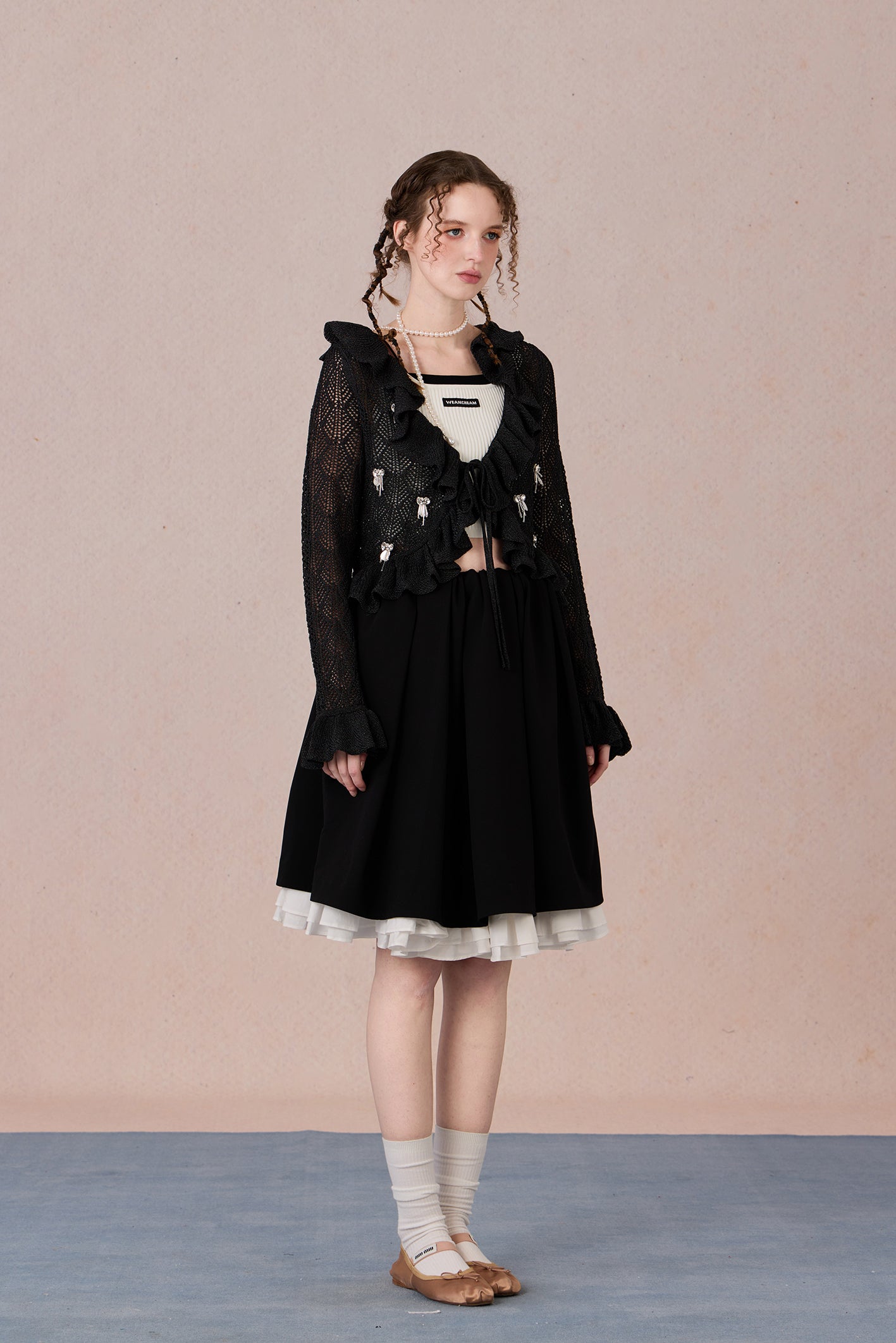 Feminine spring knit jacket styled with skirt