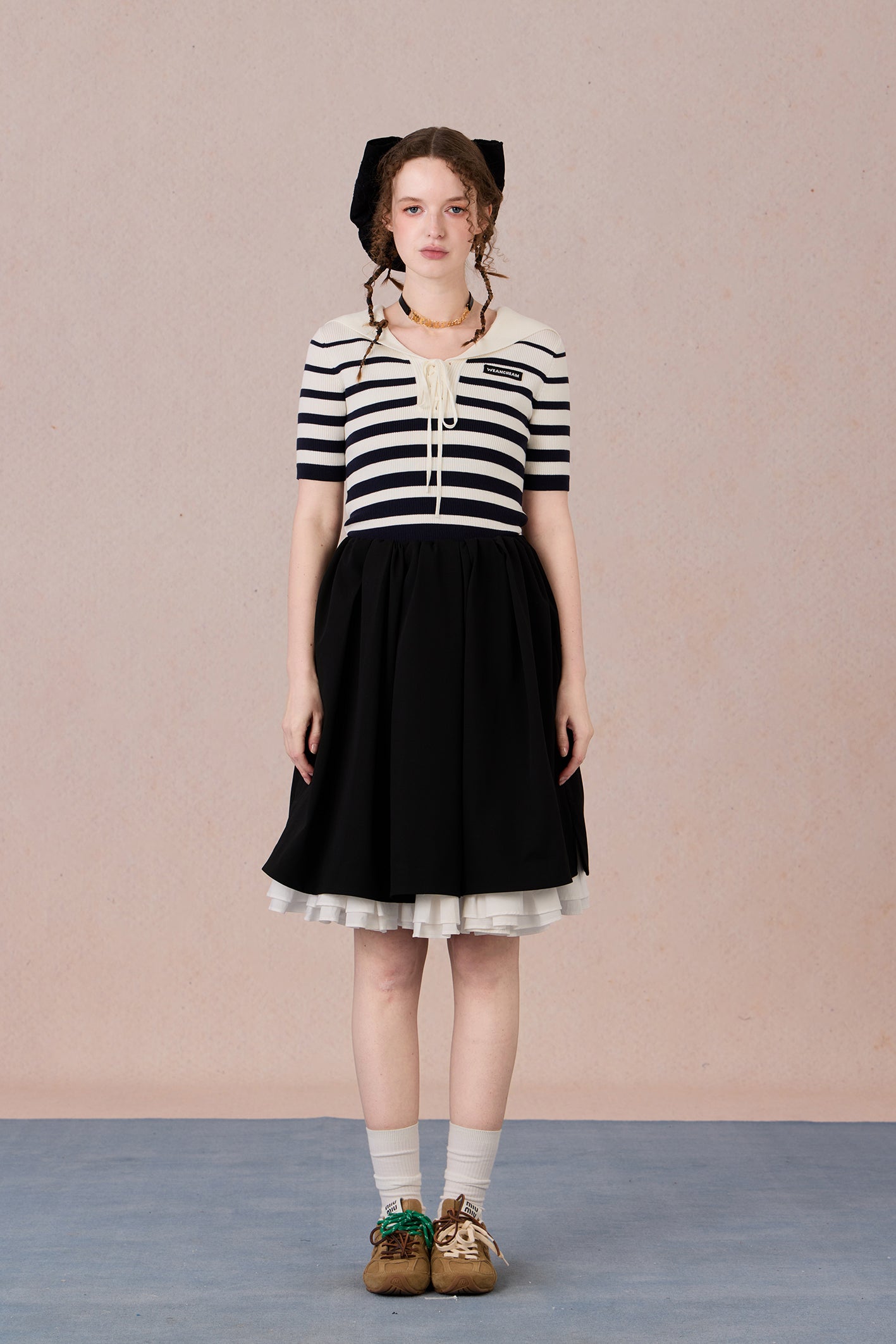Casual chic styling of embroidered striped T-shirt with contrast neckline
