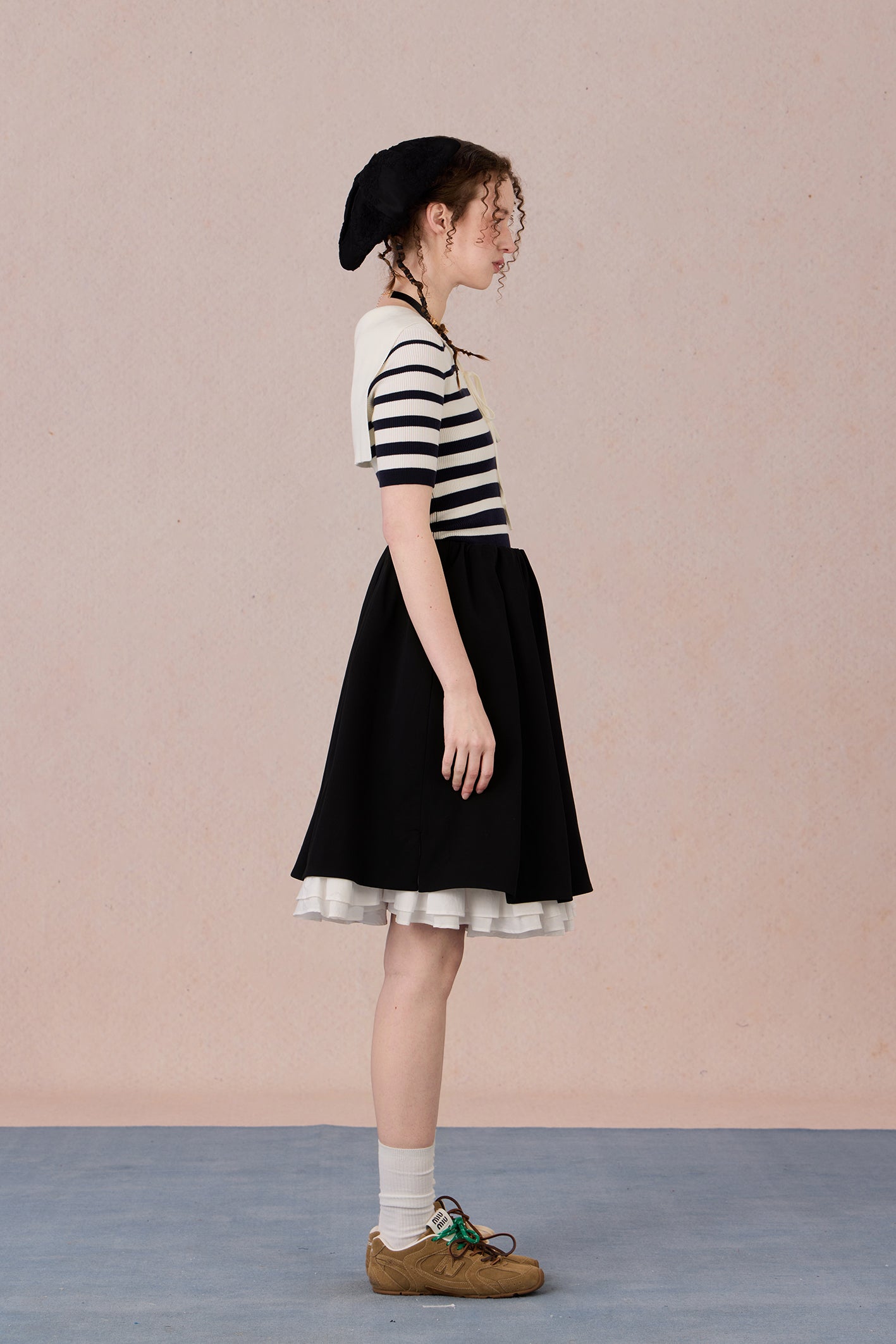 Casual chic styling of embroidered striped T-shirt with contrast neckline