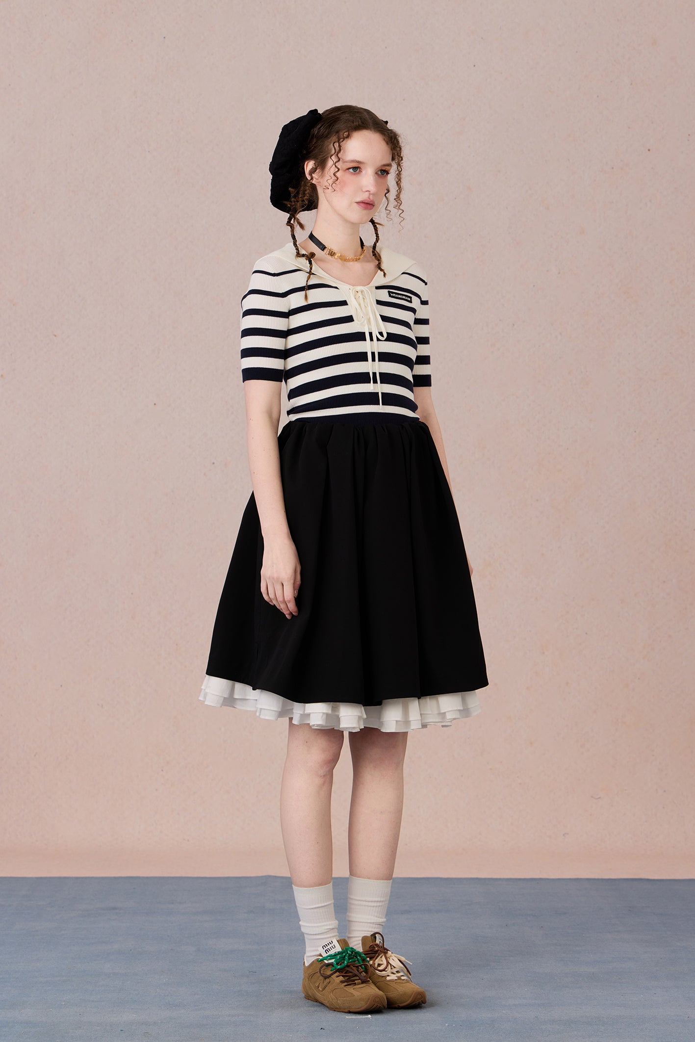 Casual chic styling of embroidered striped T-shirt with contrast neckline