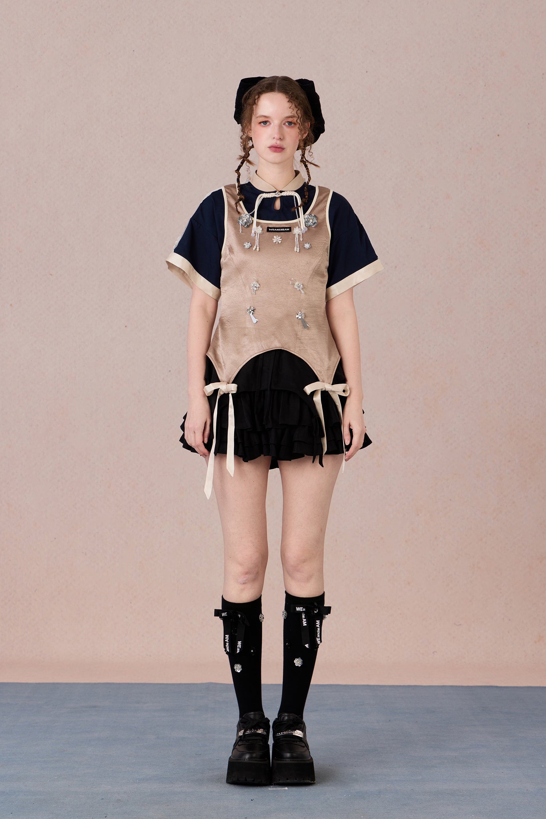  Feminine cotton blend top with handcrafted bead detail